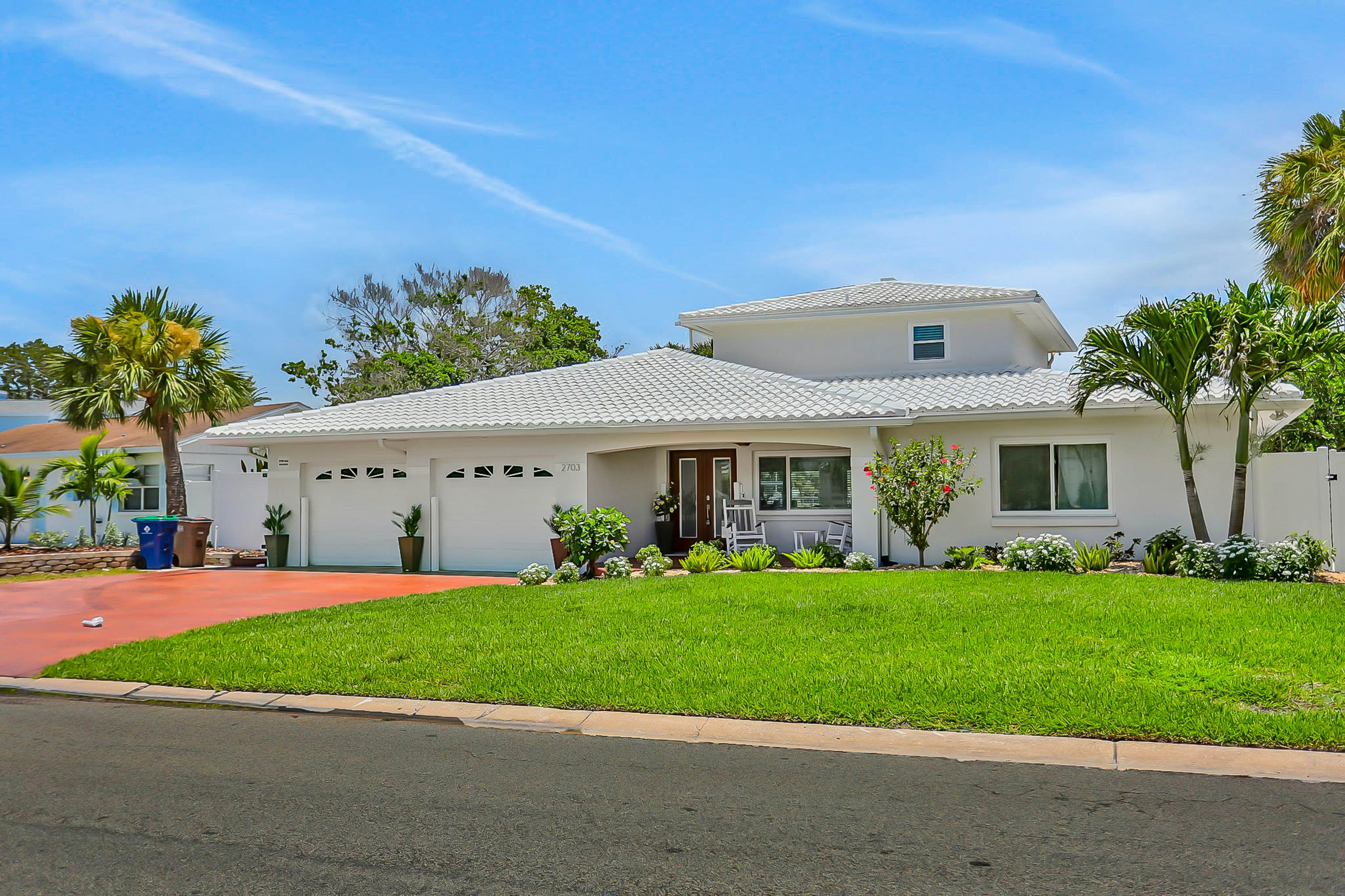 Stylish waterfront home with private pool, dock 