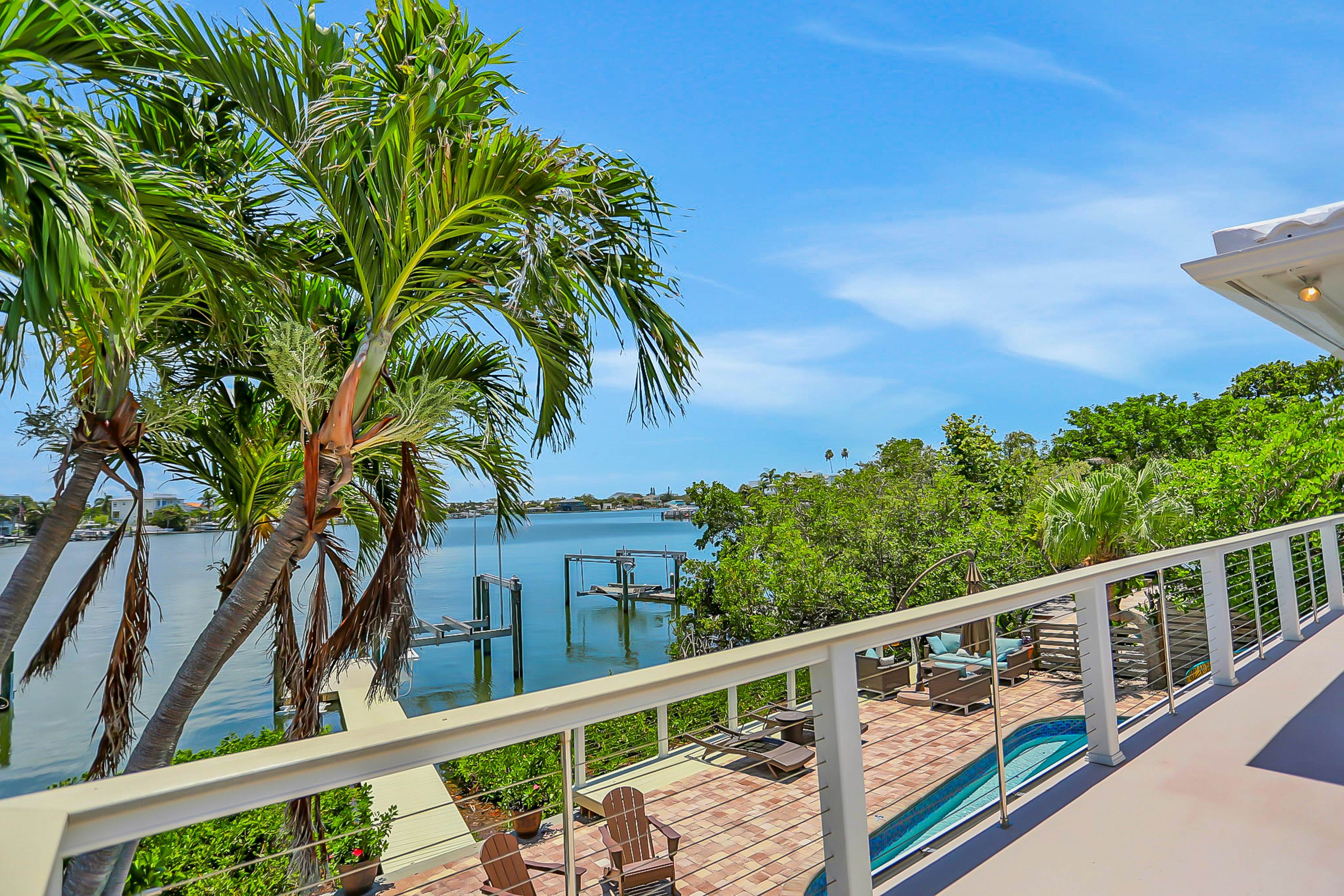 Stylish waterfront home with private pool, dock 