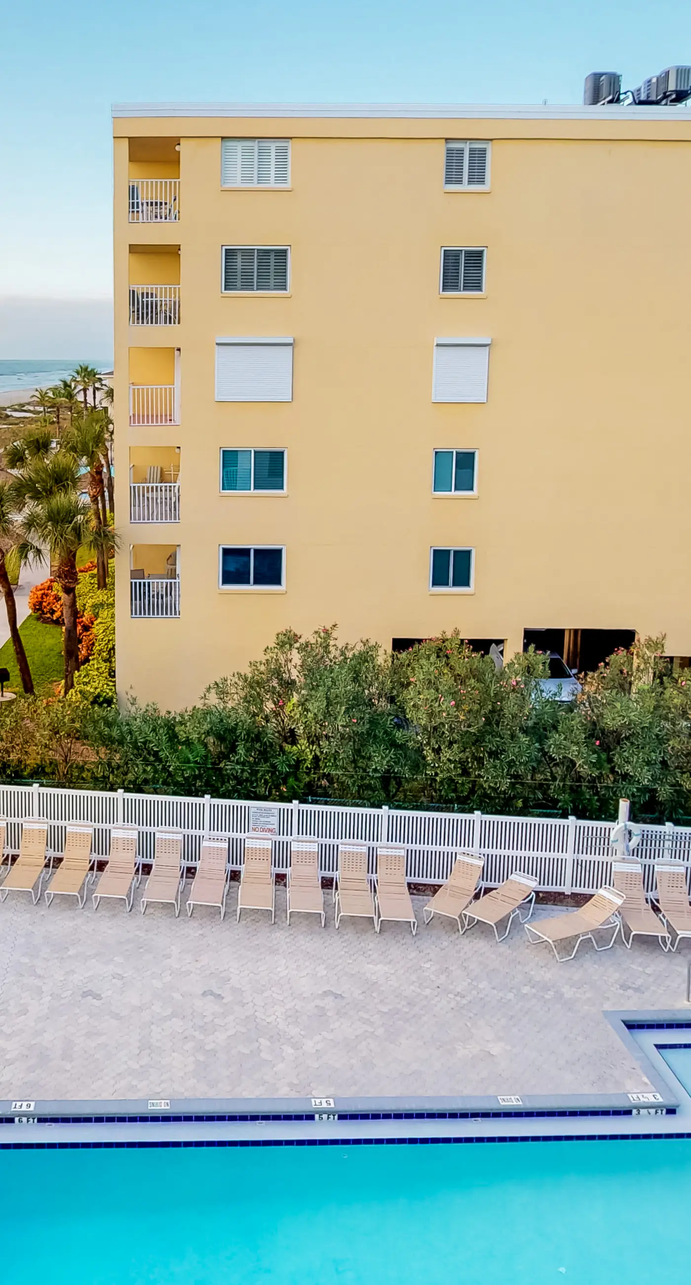Sunny beachfront condo with pool access to beach attractions