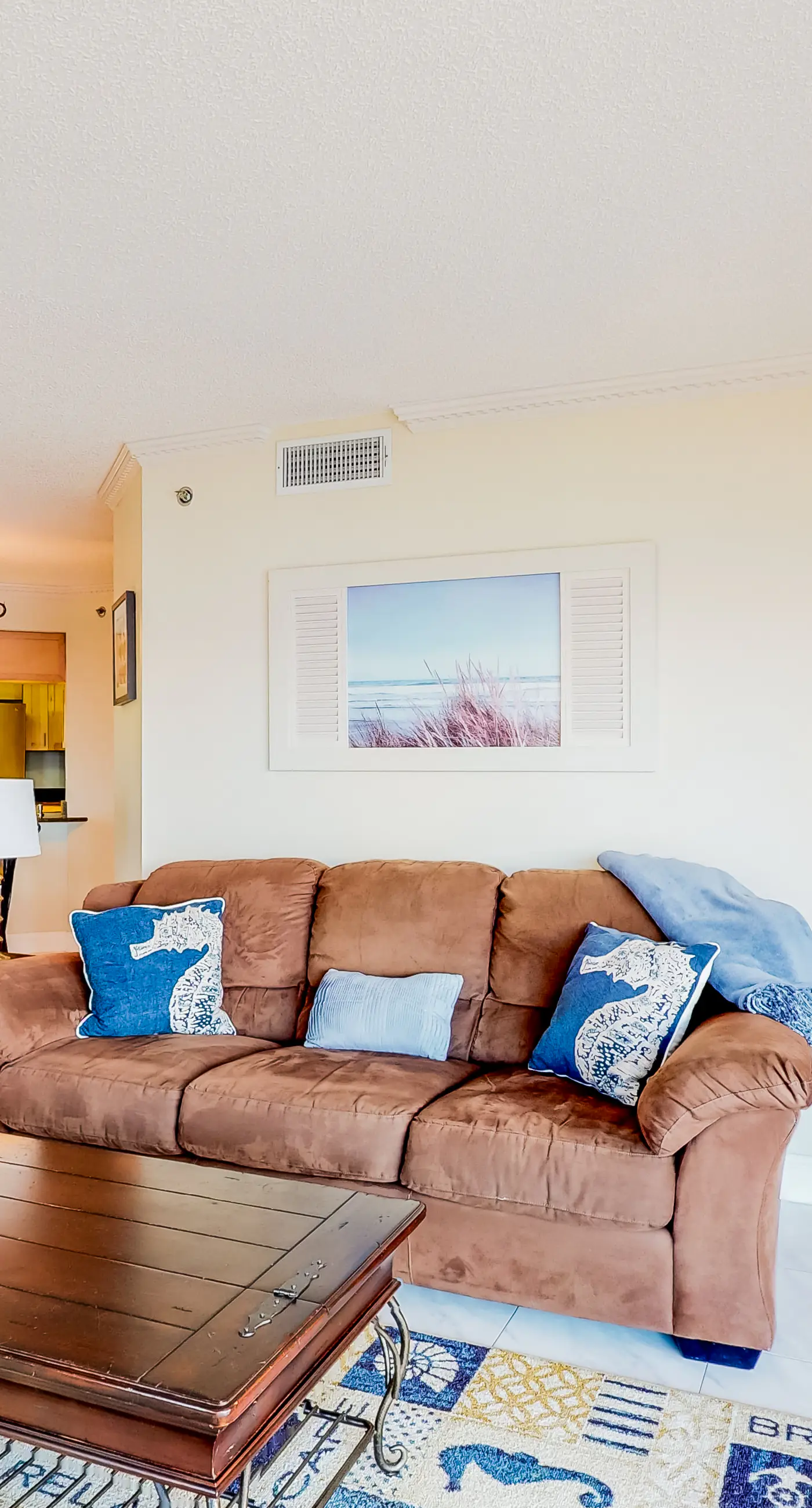 Sunny beachfront condo with pool access to beach attractions