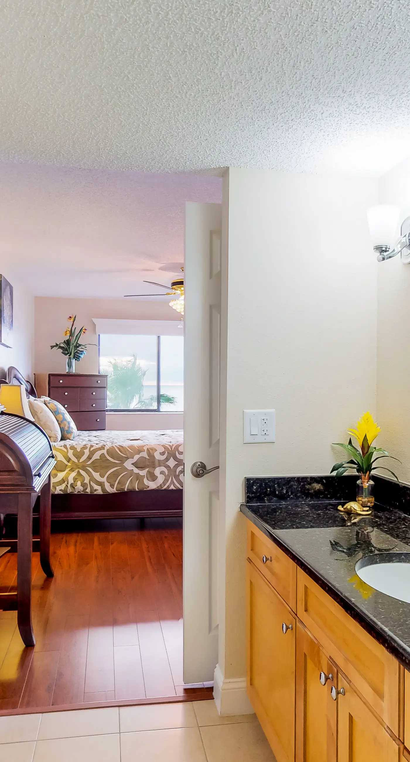 Sunny beachfront condo with pool access to beach attractions