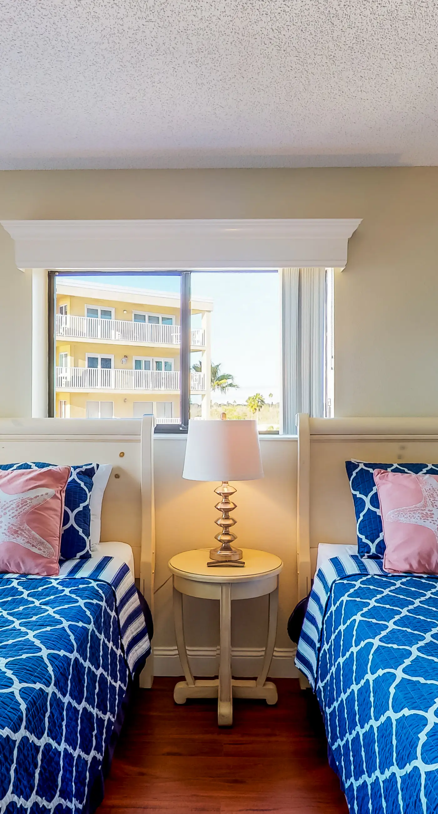 Sunny beachfront condo with pool access to beach attractions