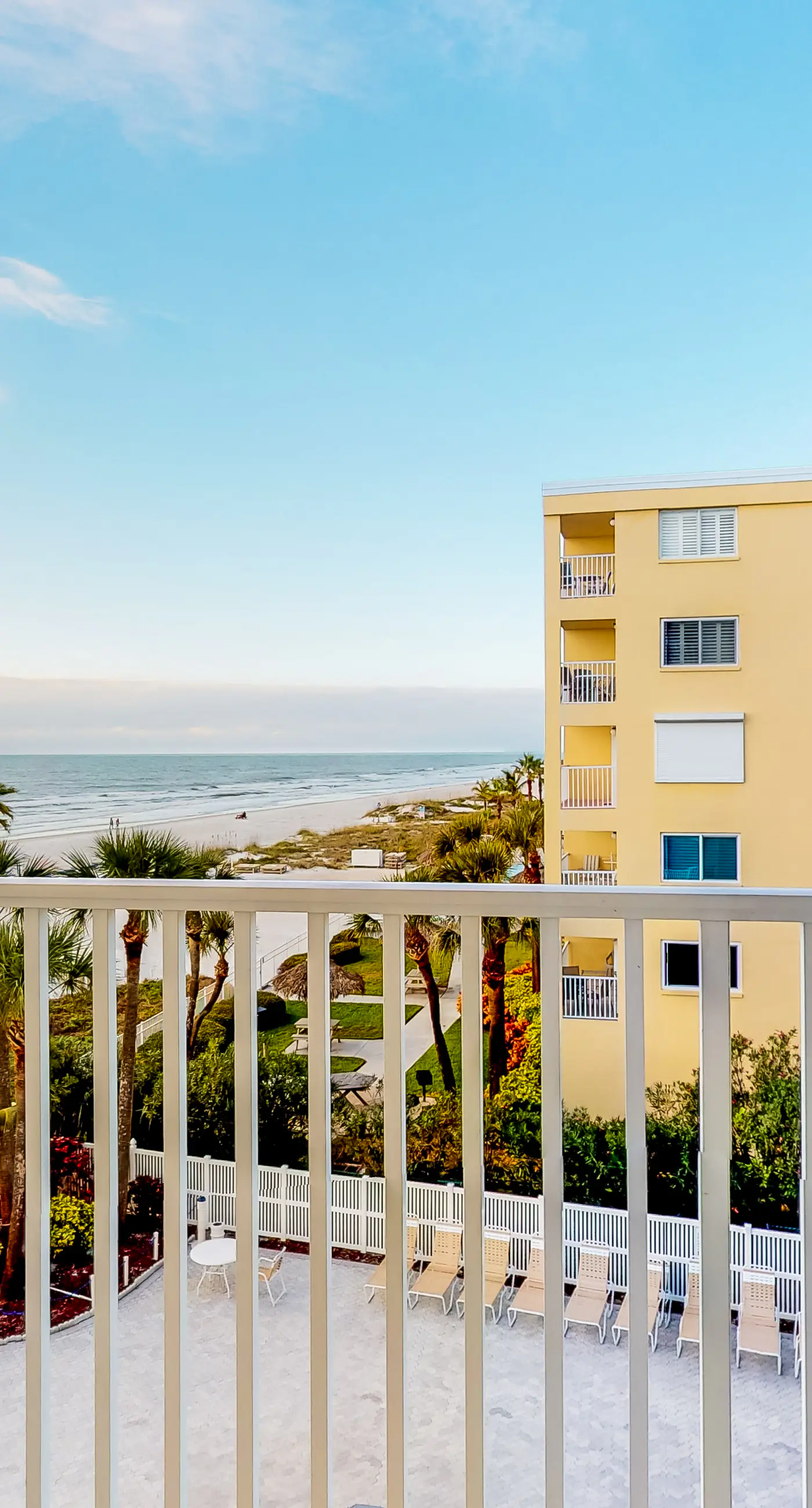 Sunny beachfront condo with pool access to beach attractions