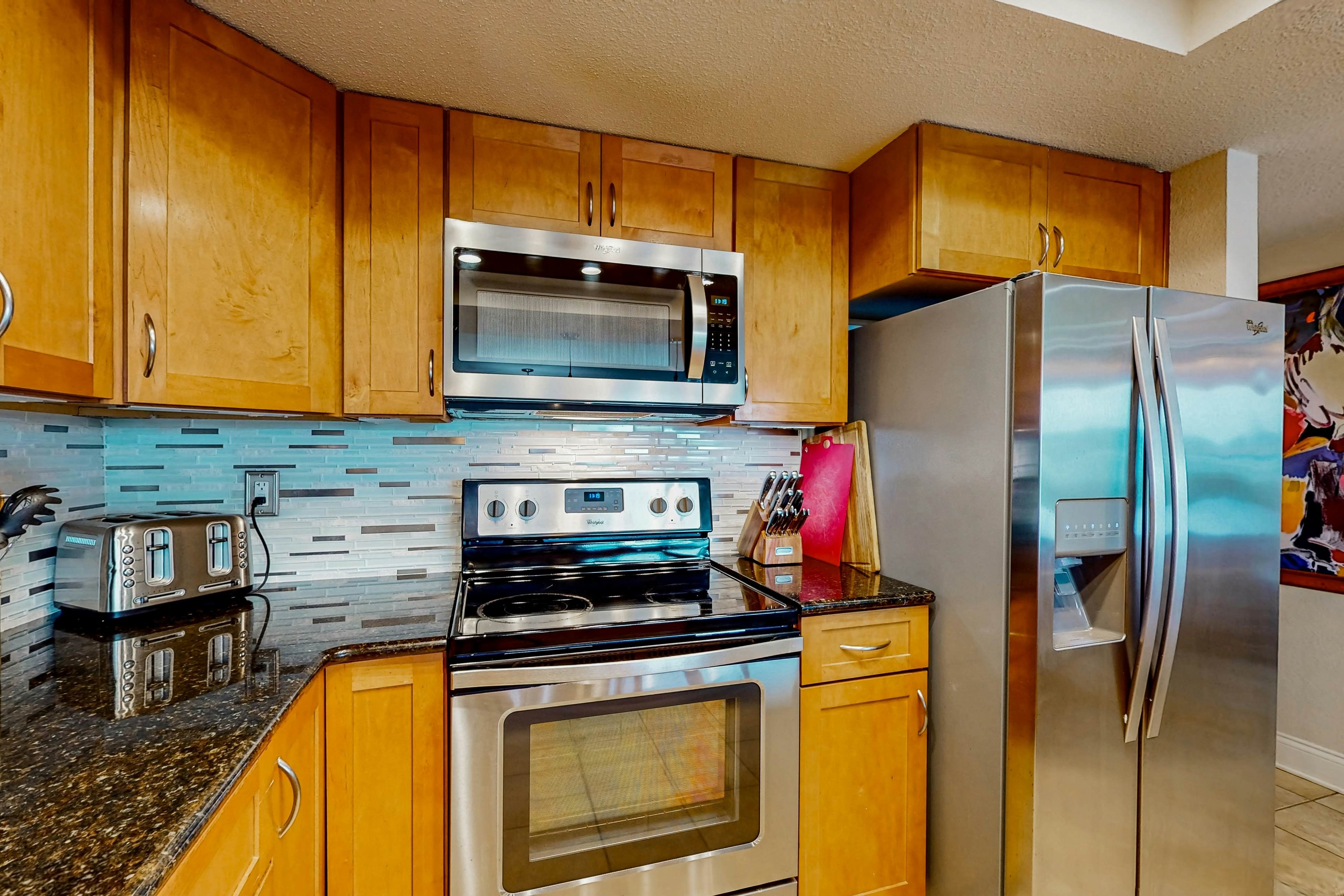 Family-Friendly Condo w/Balcony, Shared Grills, Outdoor Pool, Fast WiFi, & Views