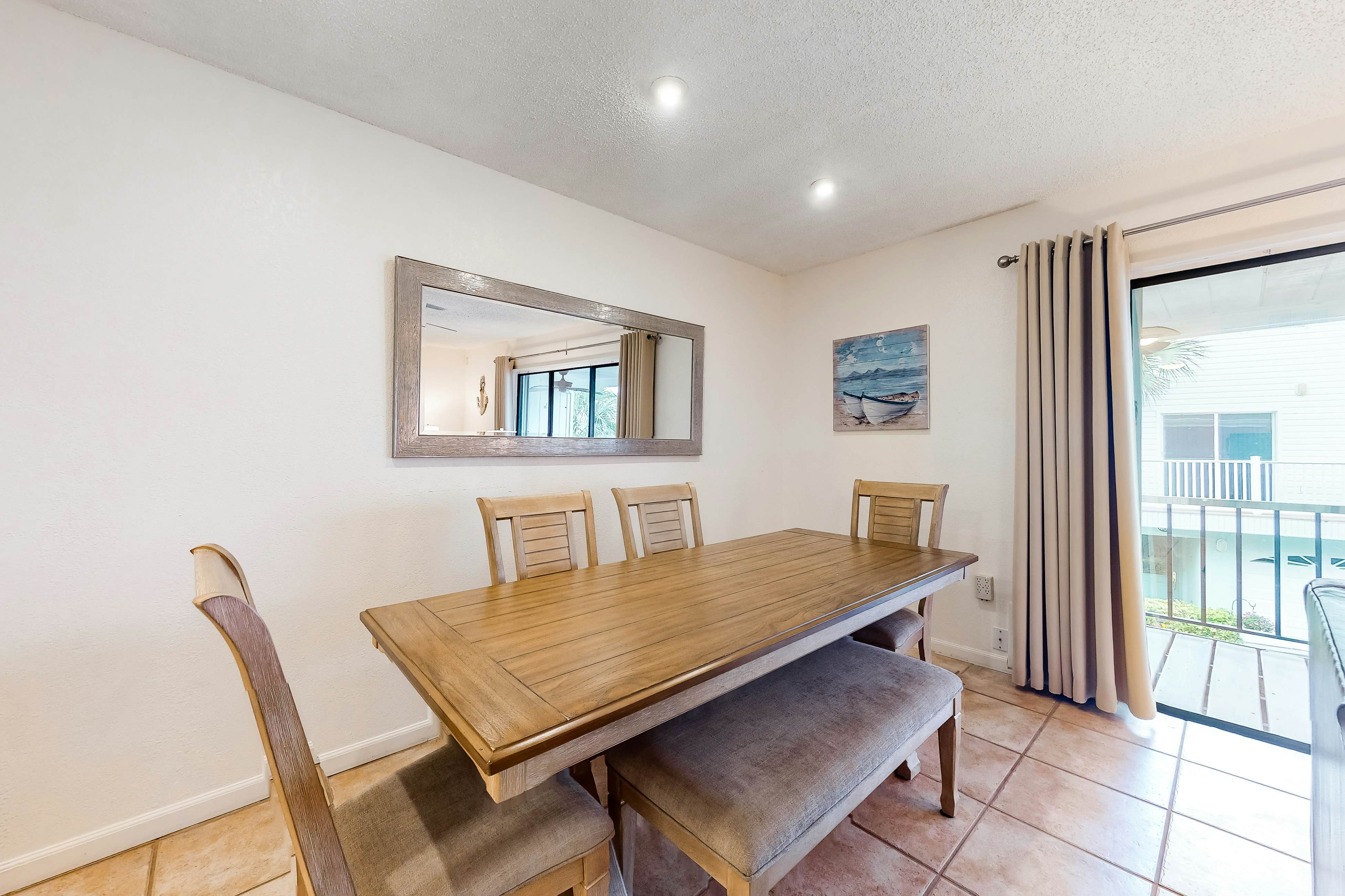 Quiet condo across from beach with Intracoastal-view pool, grill & fishing dock