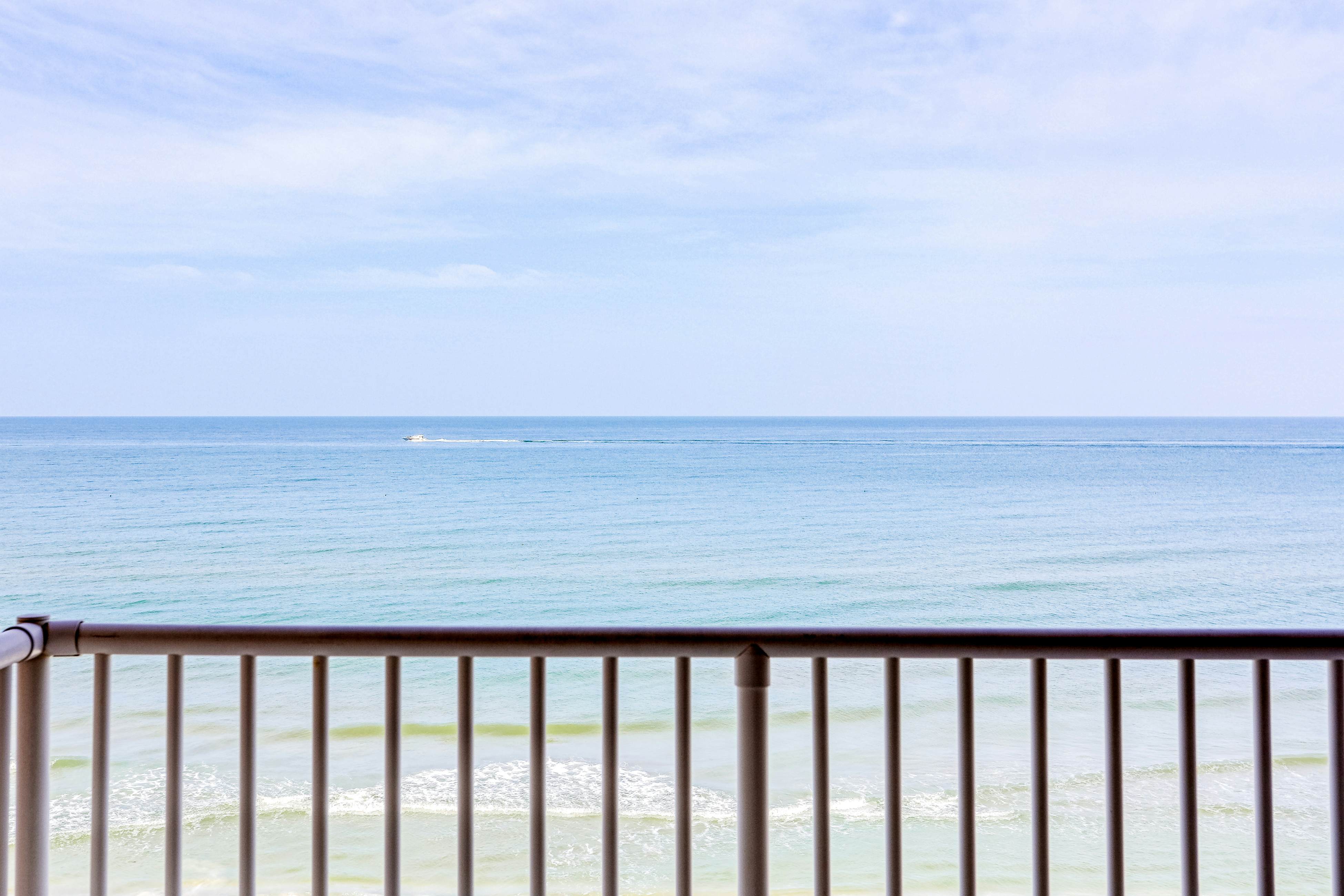 Delightful waterfront condo with sweeping views, beach access, balcony & pool