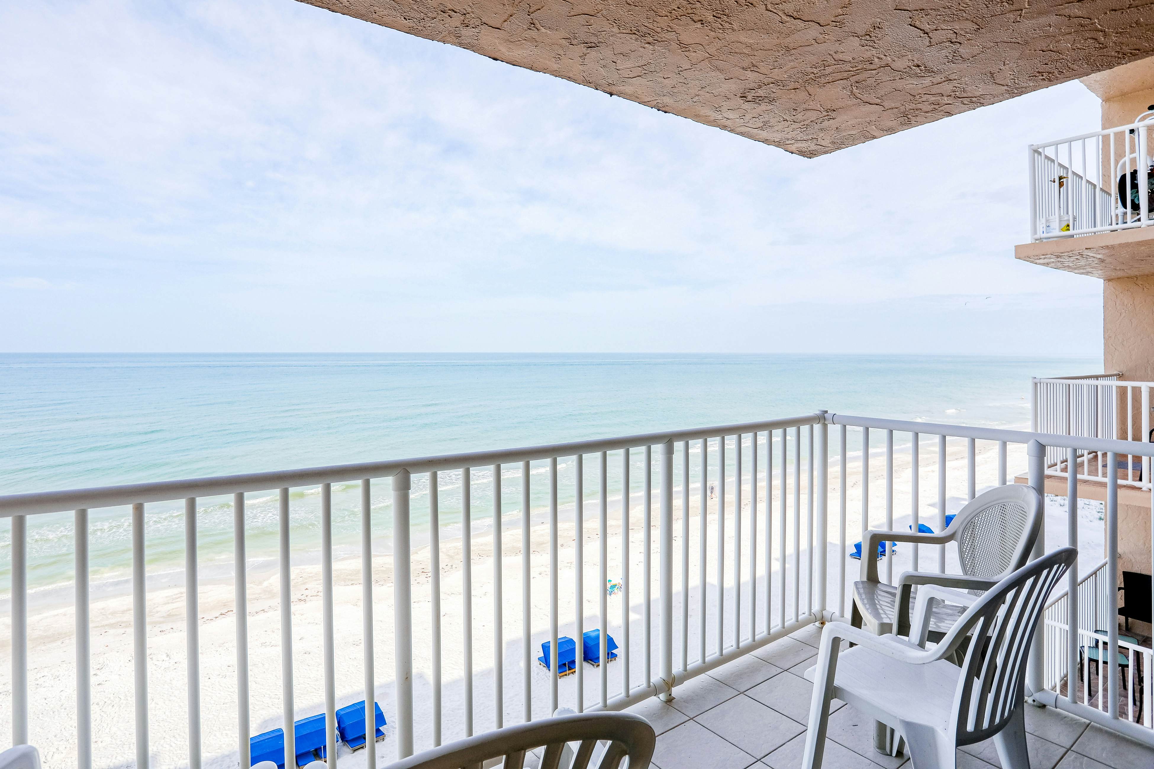 Delightful waterfront condo with sweeping views, beach access, balcony & pool