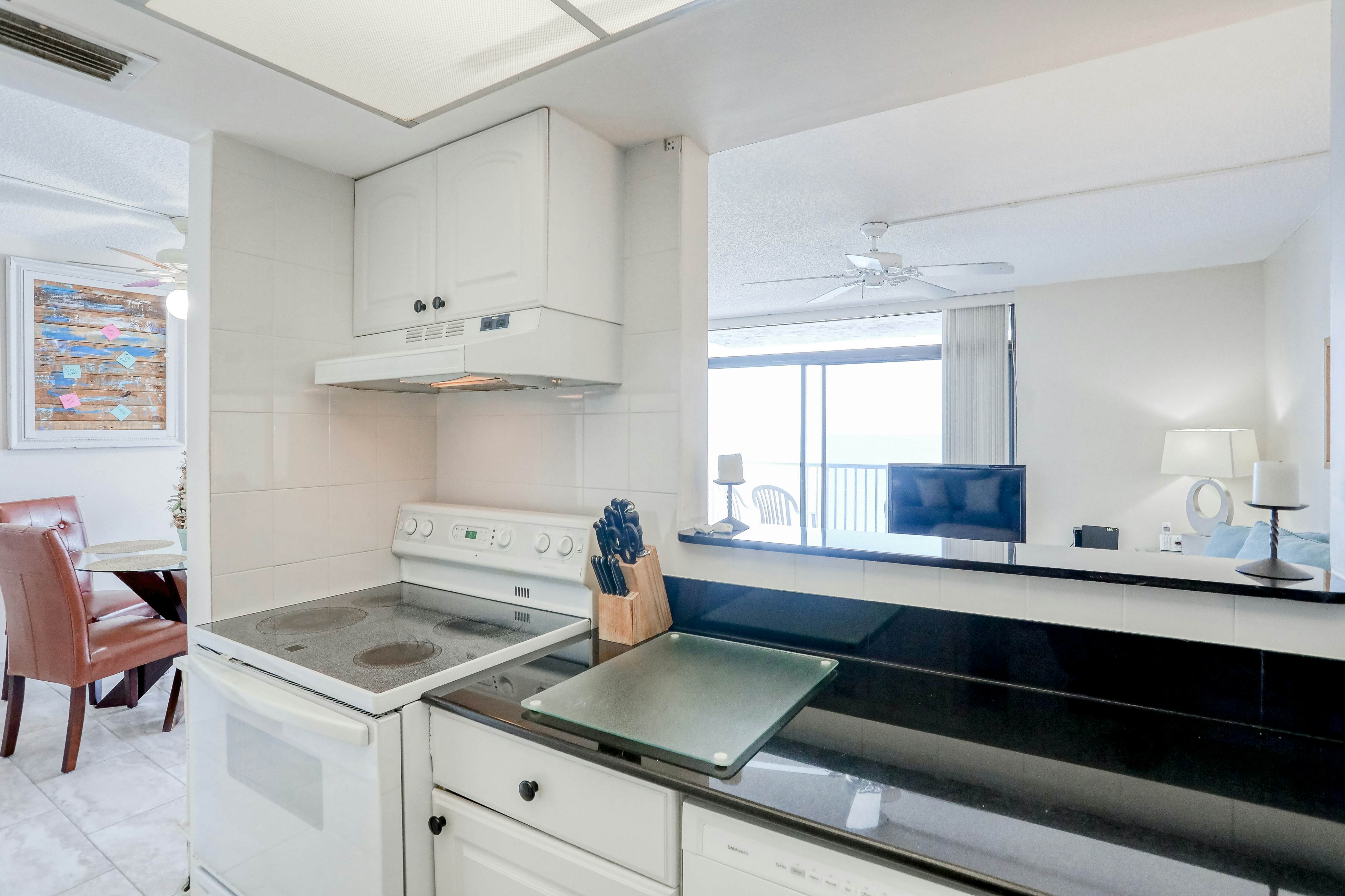 Delightful waterfront condo with sweeping views, beach access, balcony & pool