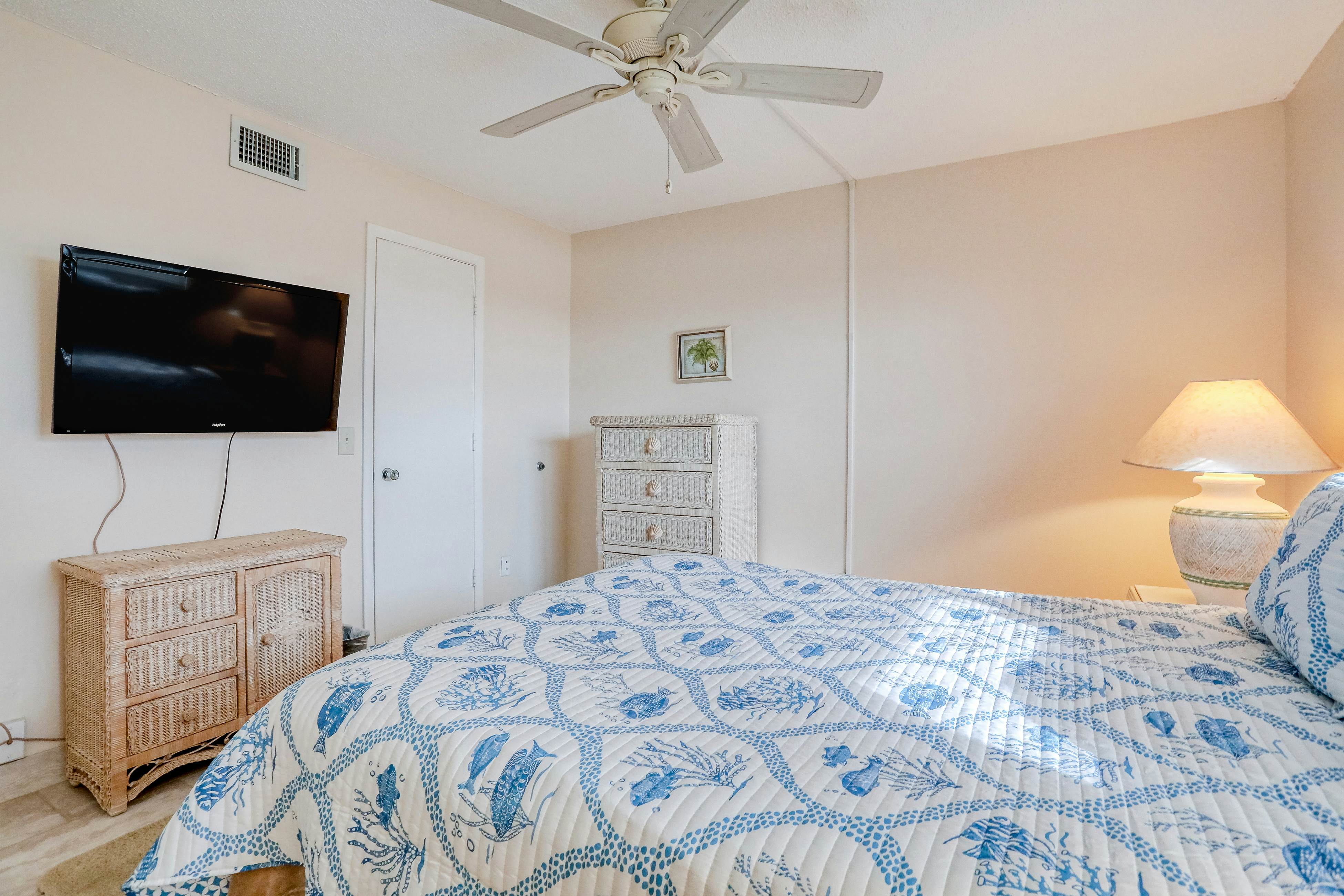 Delightful waterfront condo with sweeping views, beach access, balcony & pool