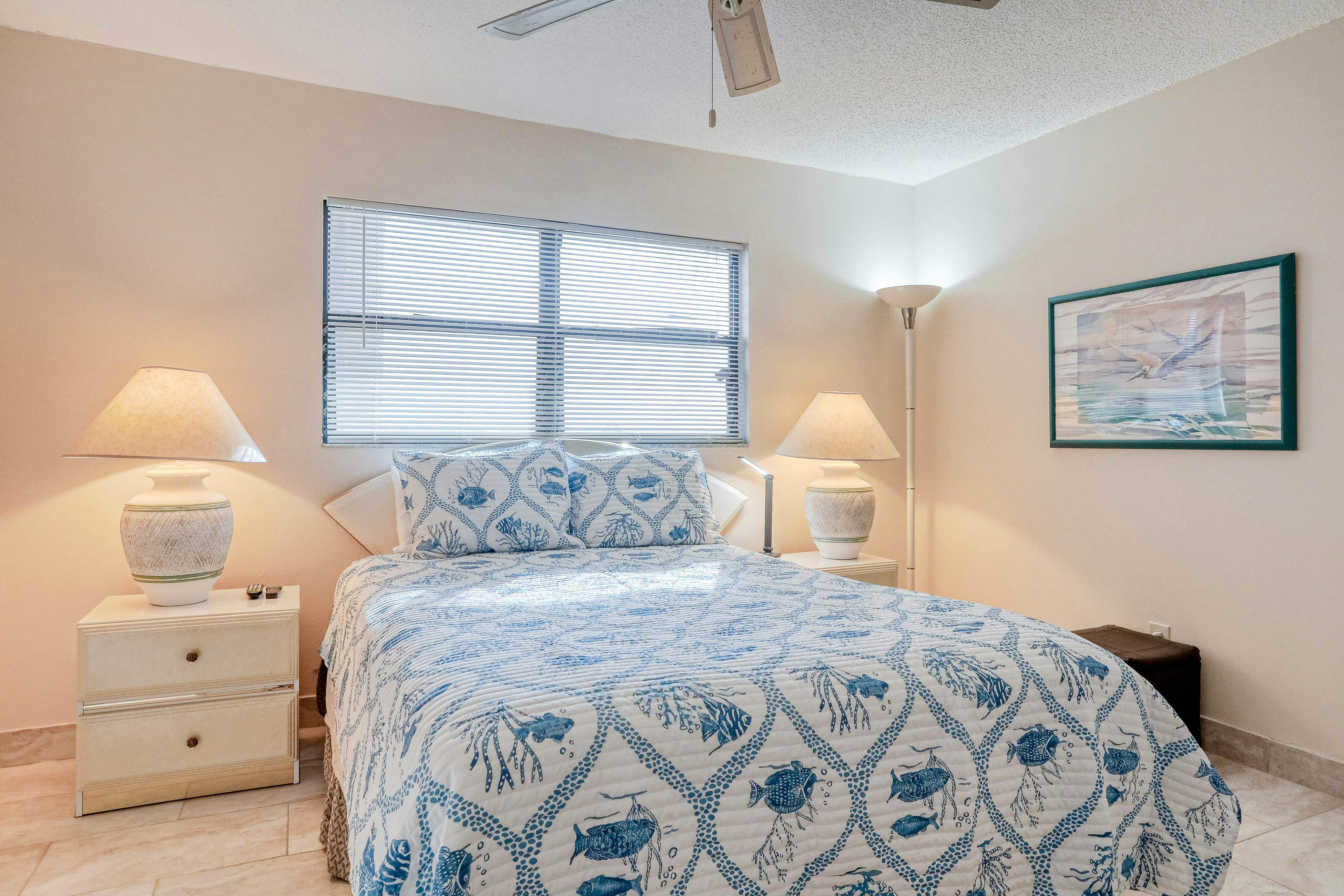 Delightful waterfront condo with sweeping views, beach access, balcony & pool