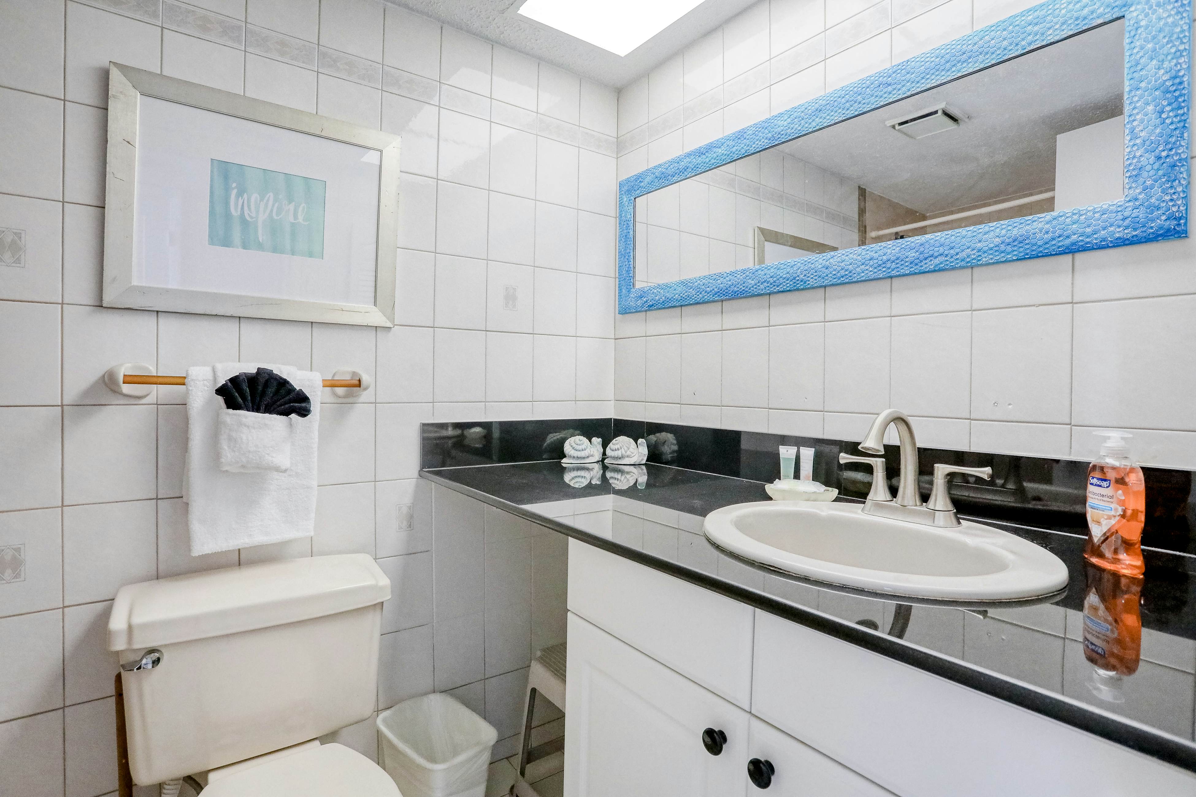 Delightful waterfront condo with sweeping views, beach access, balcony & pool