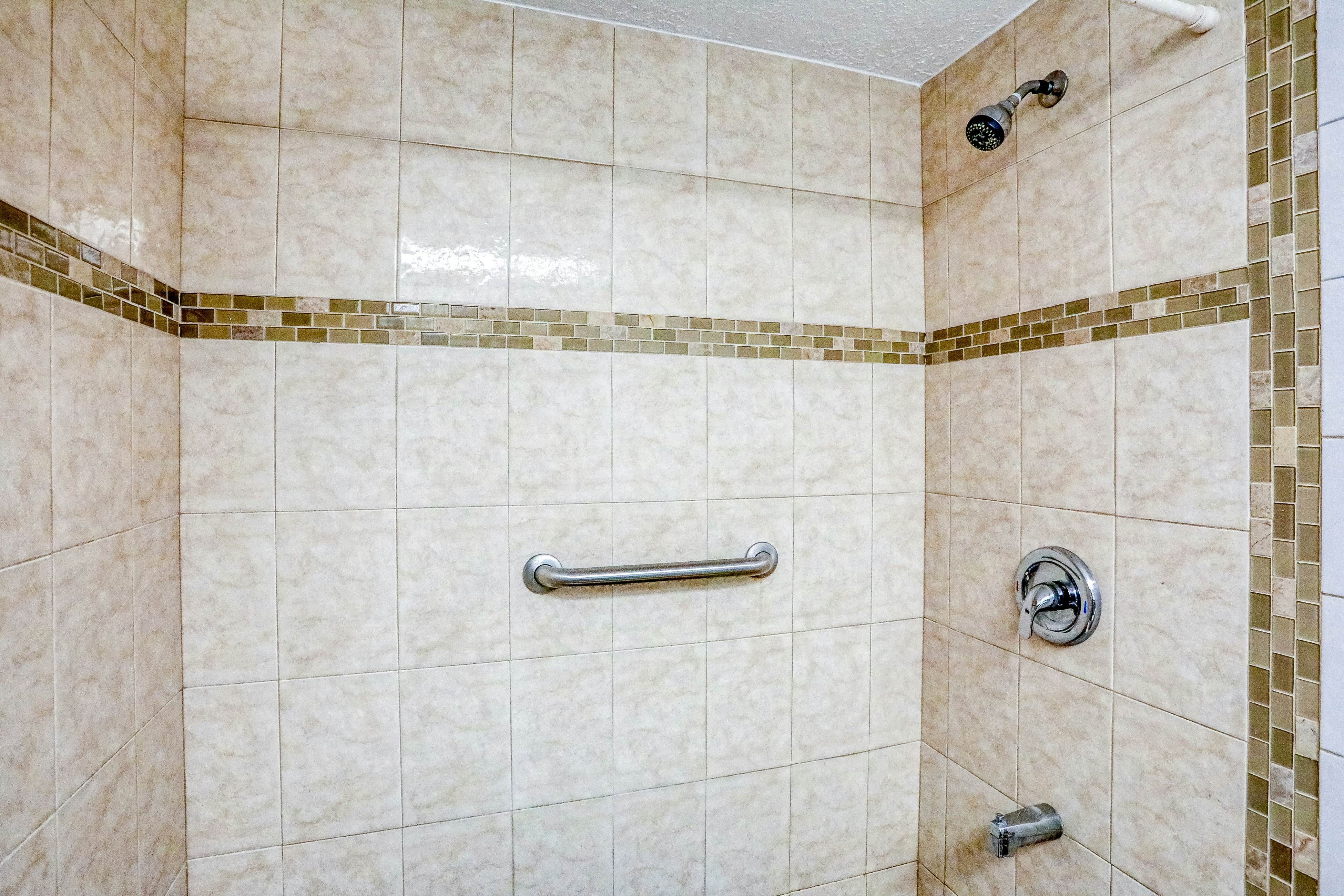 Delightful waterfront condo with sweeping views, beach access, balcony & pool