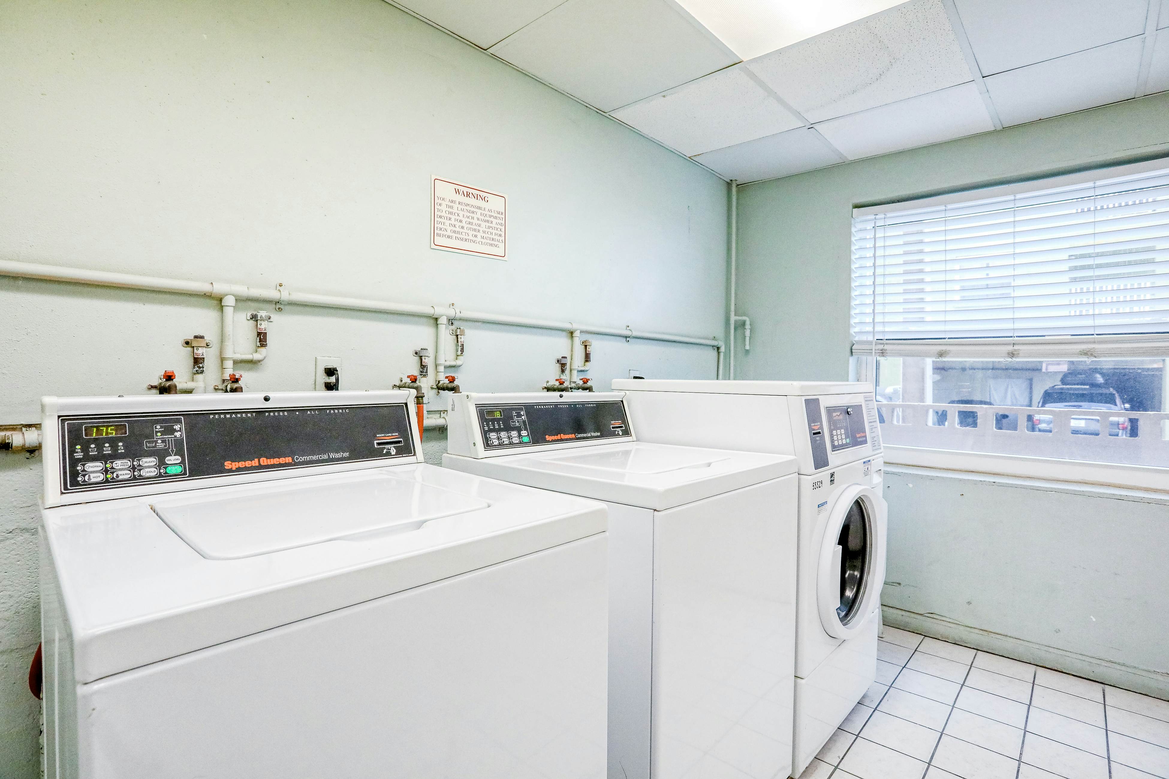 Delightful waterfront condo with sweeping views, beach access, balcony & pool