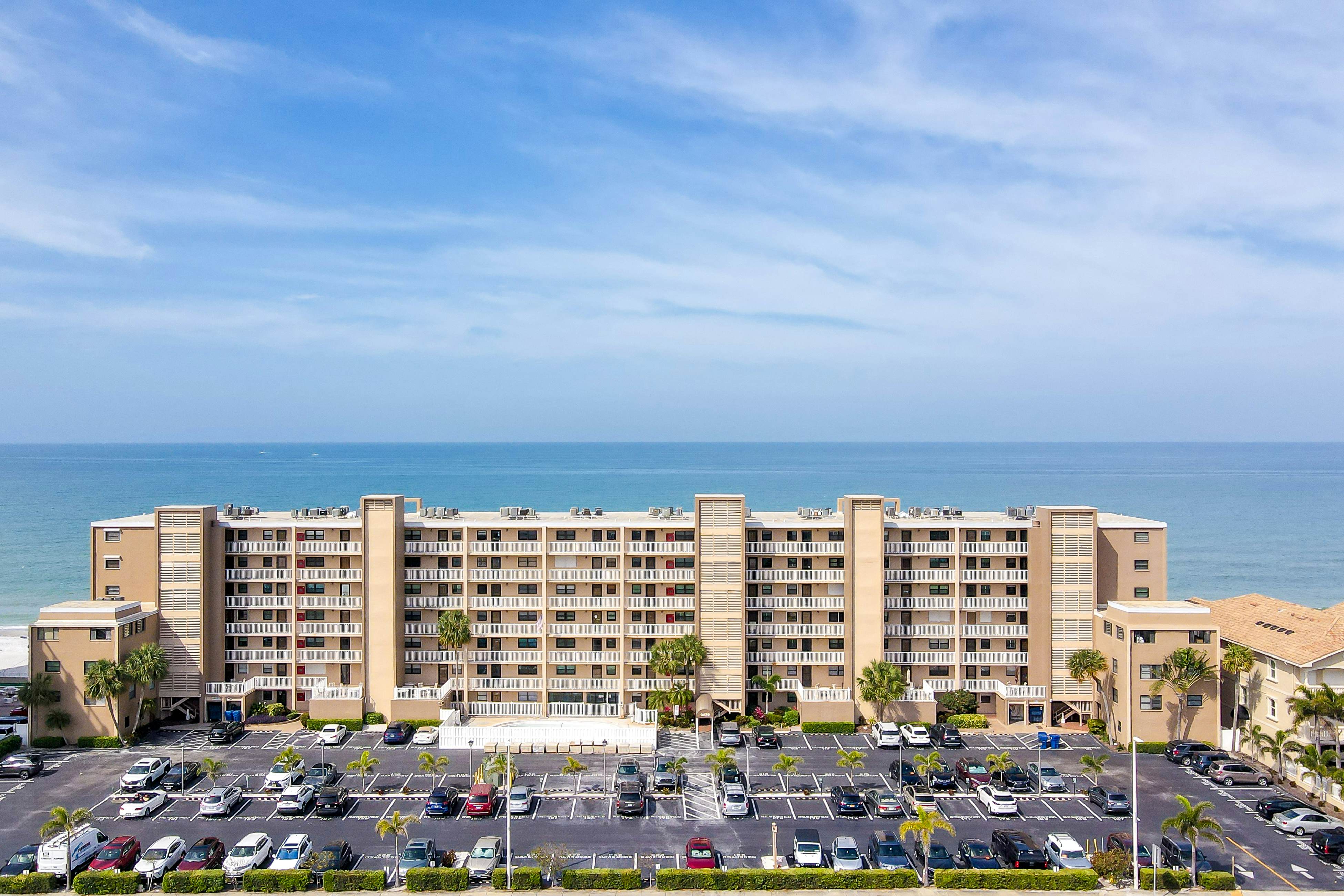 Delightful waterfront condo with sweeping views, beach access, balcony & pool