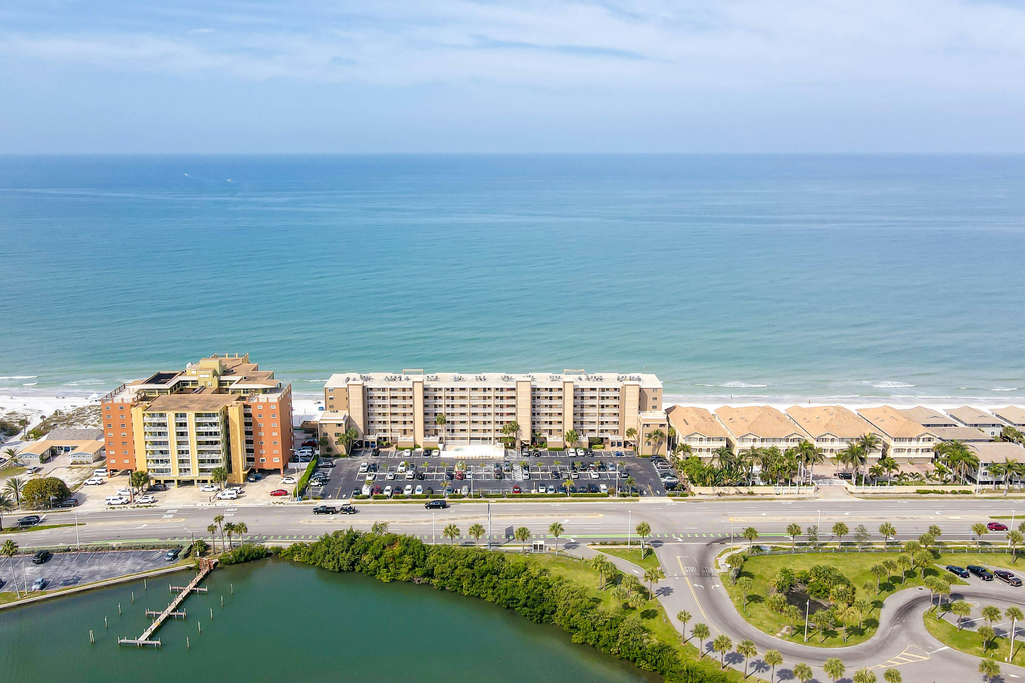 Delightful waterfront condo with sweeping views, beach access, balcony & pool
