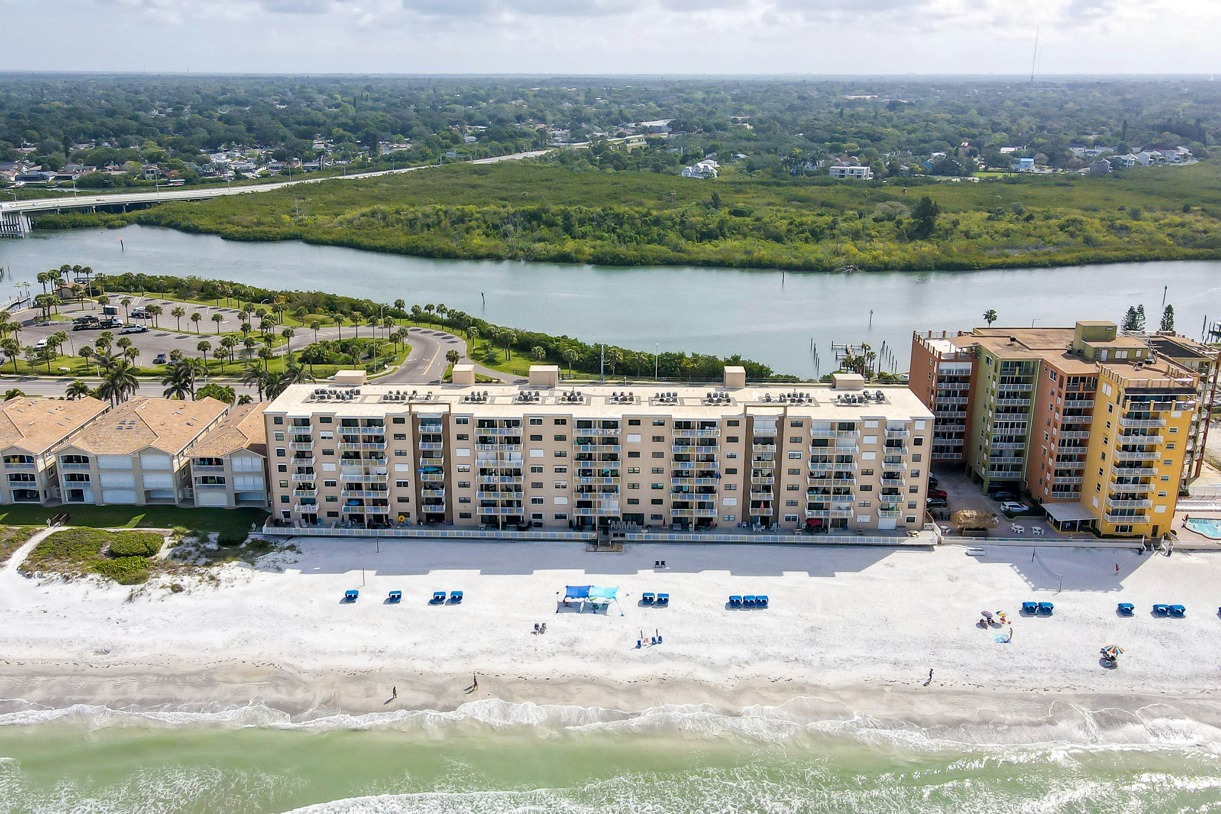Delightful waterfront condo with sweeping views, beach access, balcony & pool