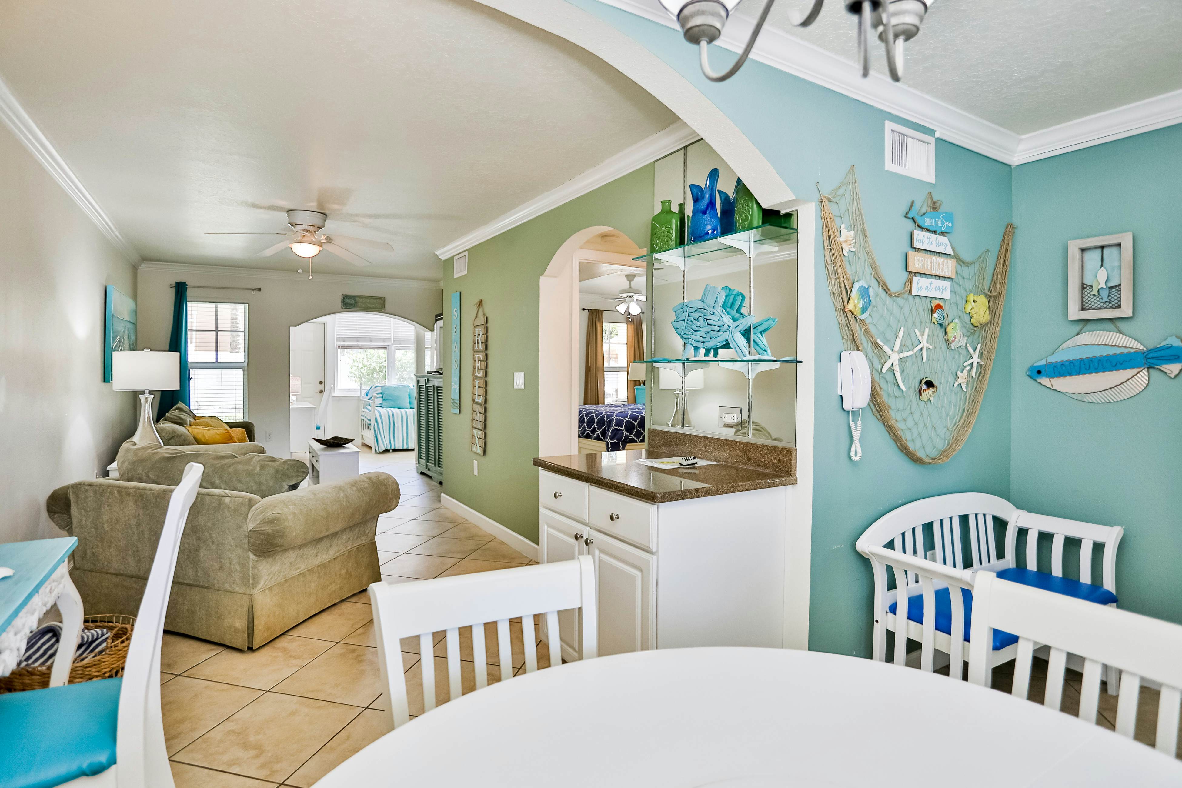 1st-floor condo with private dock, easy beach access, heated pool, & patio