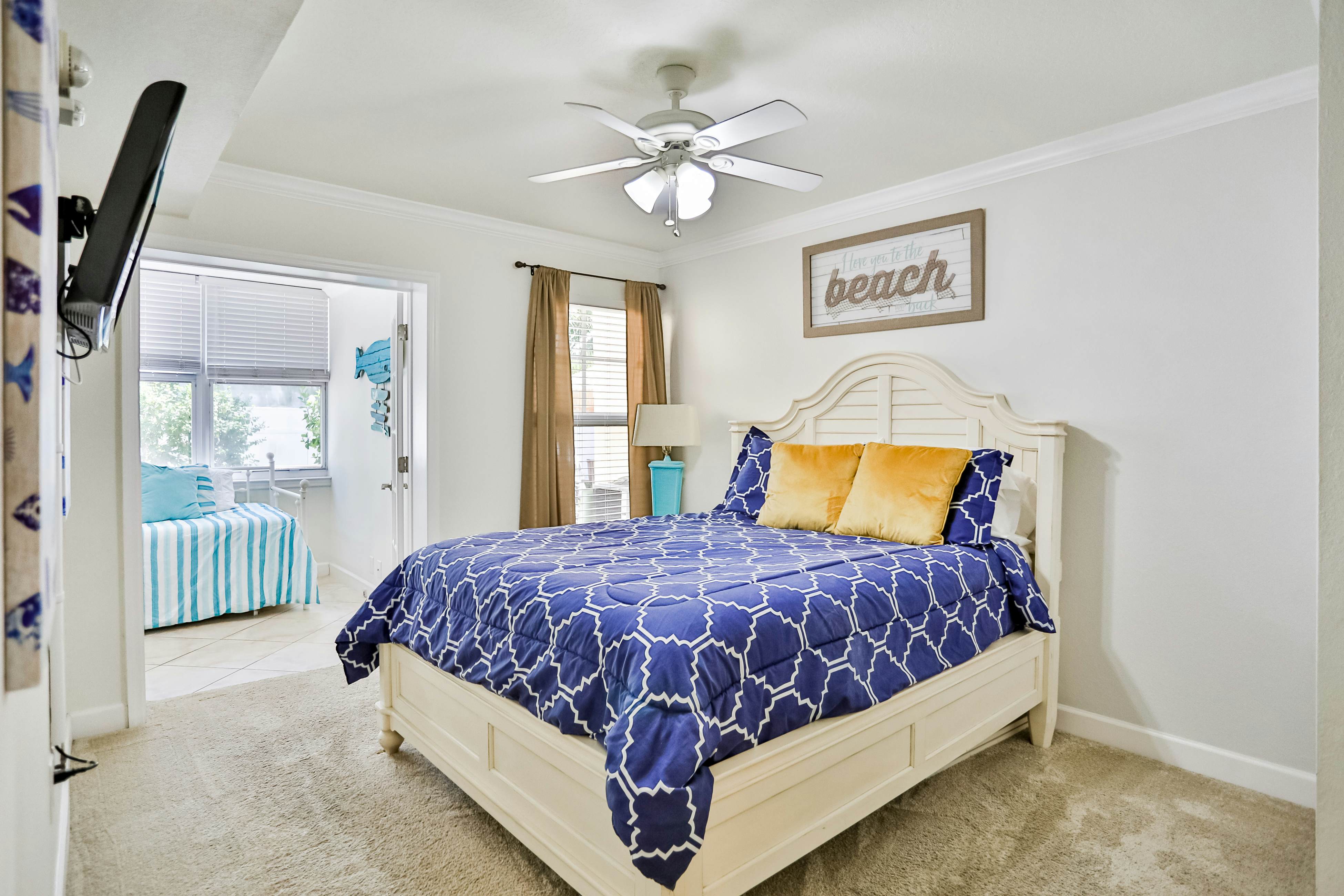 1st-floor condo with private dock, easy beach access, heated pool, & patio