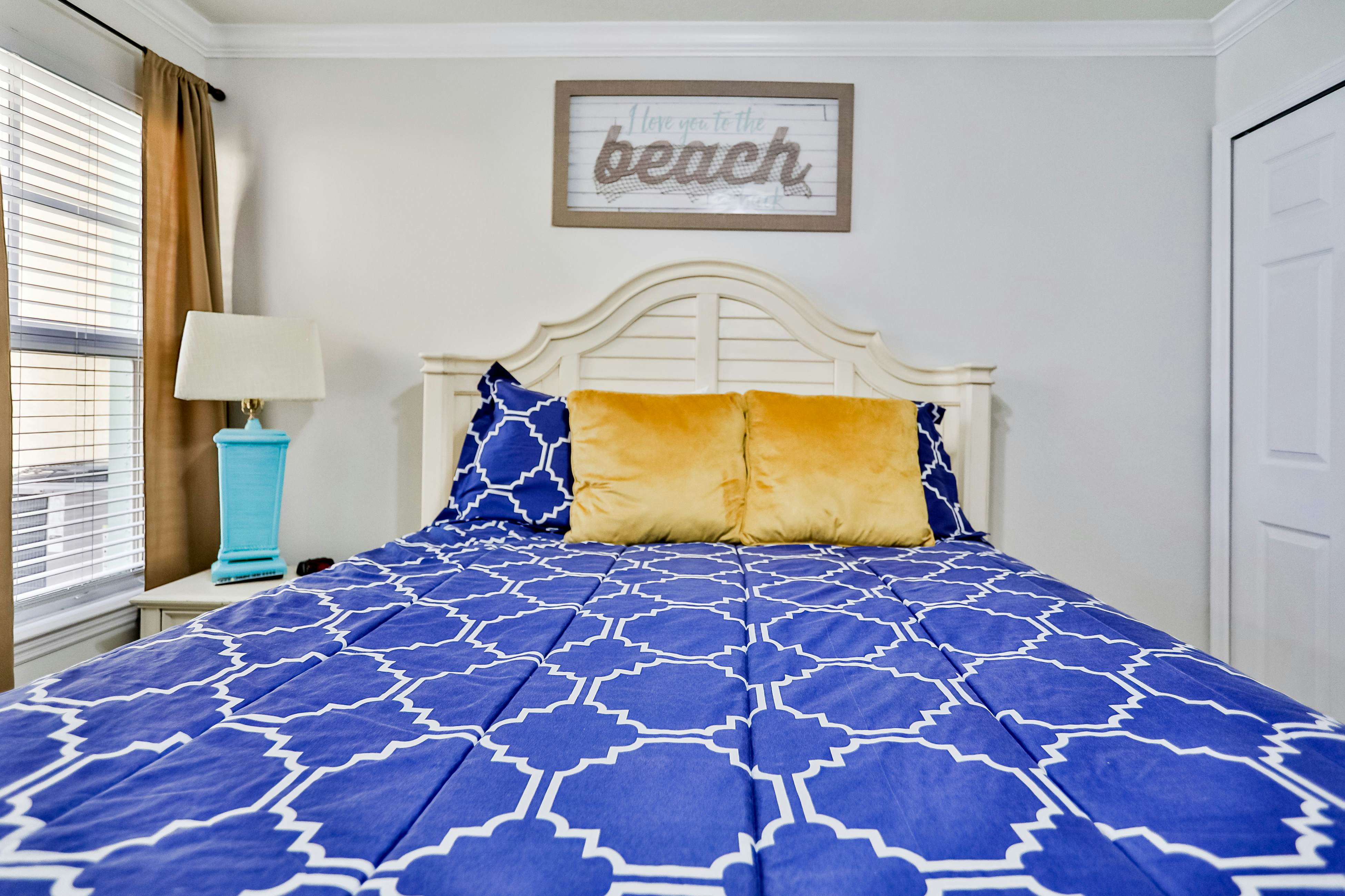 1st-floor condo with private dock, easy beach access, heated pool, & patio