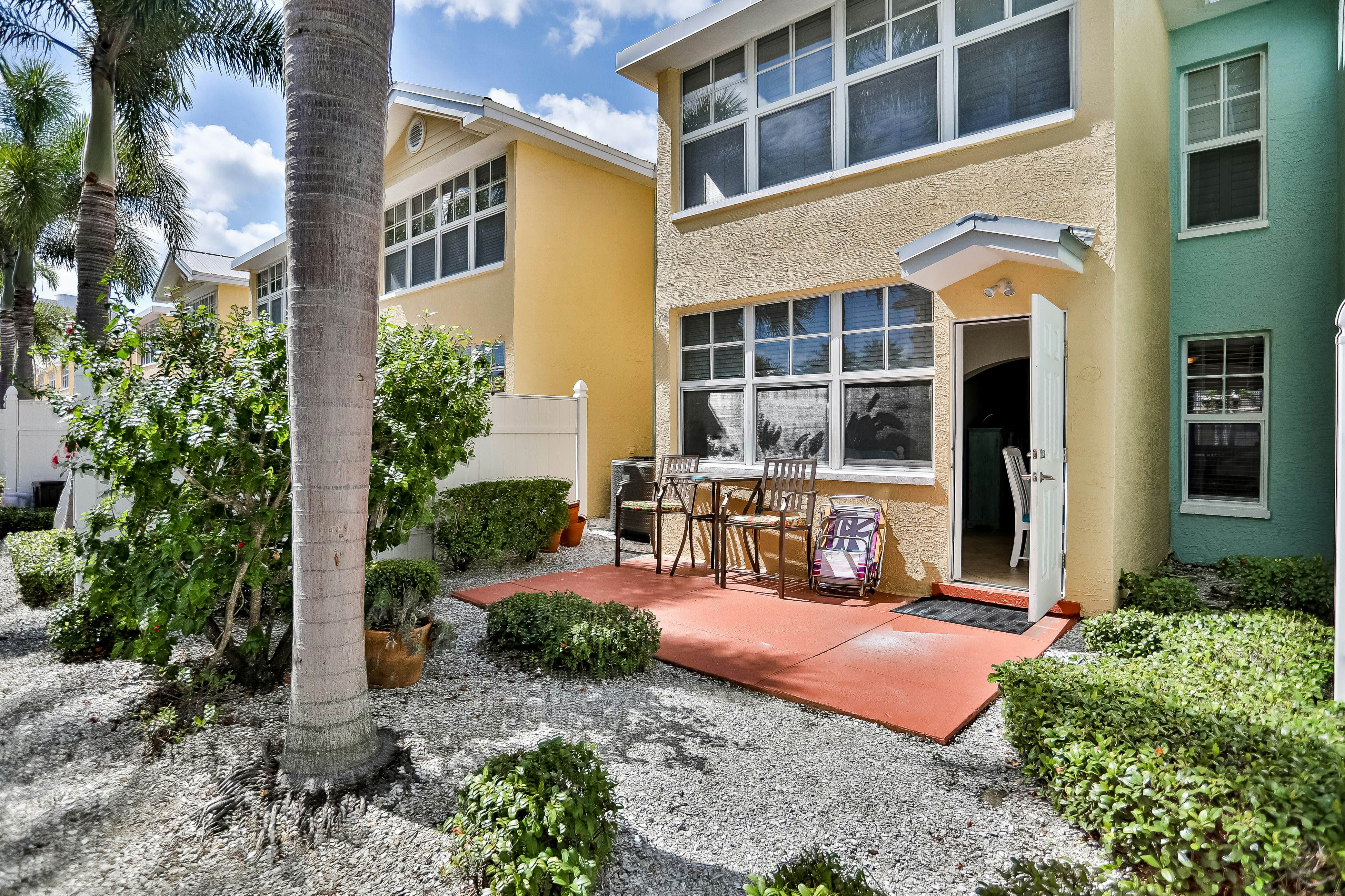 1st-floor condo with private dock, easy beach access, heated pool, & patio