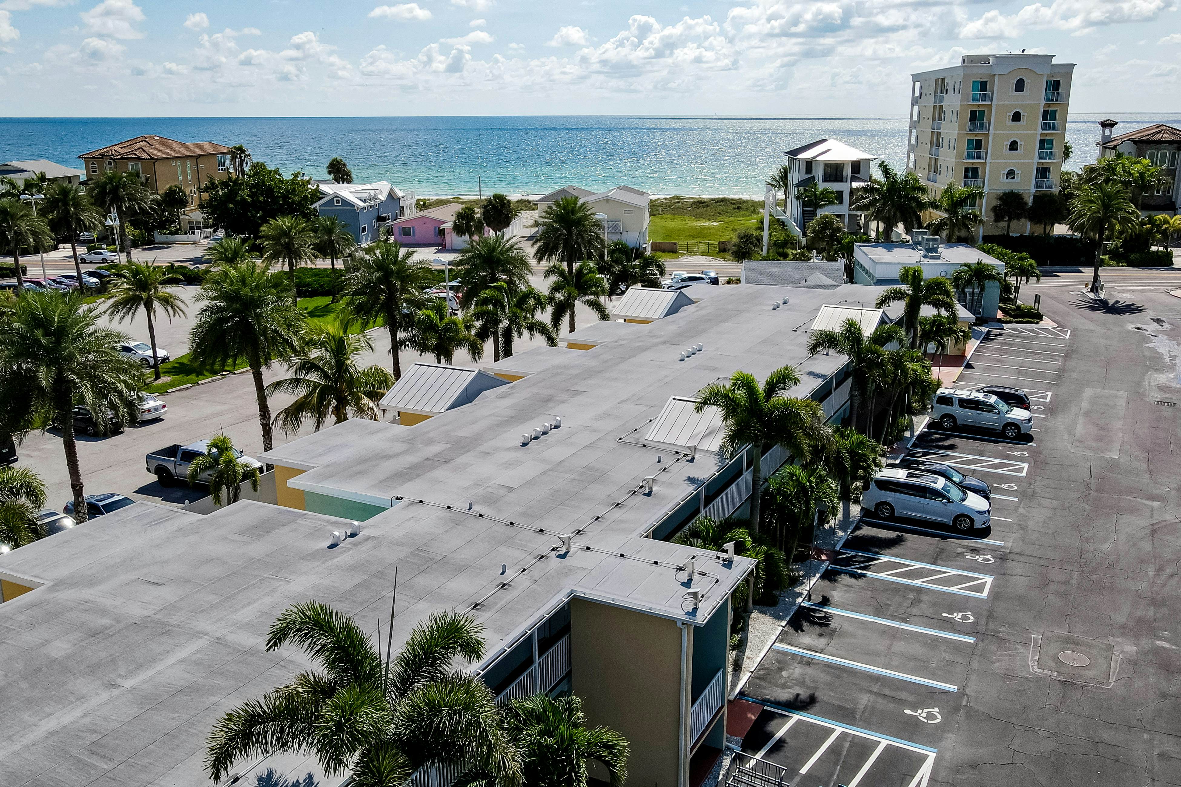 1st-floor condo with private dock, easy beach access, heated pool, & patio