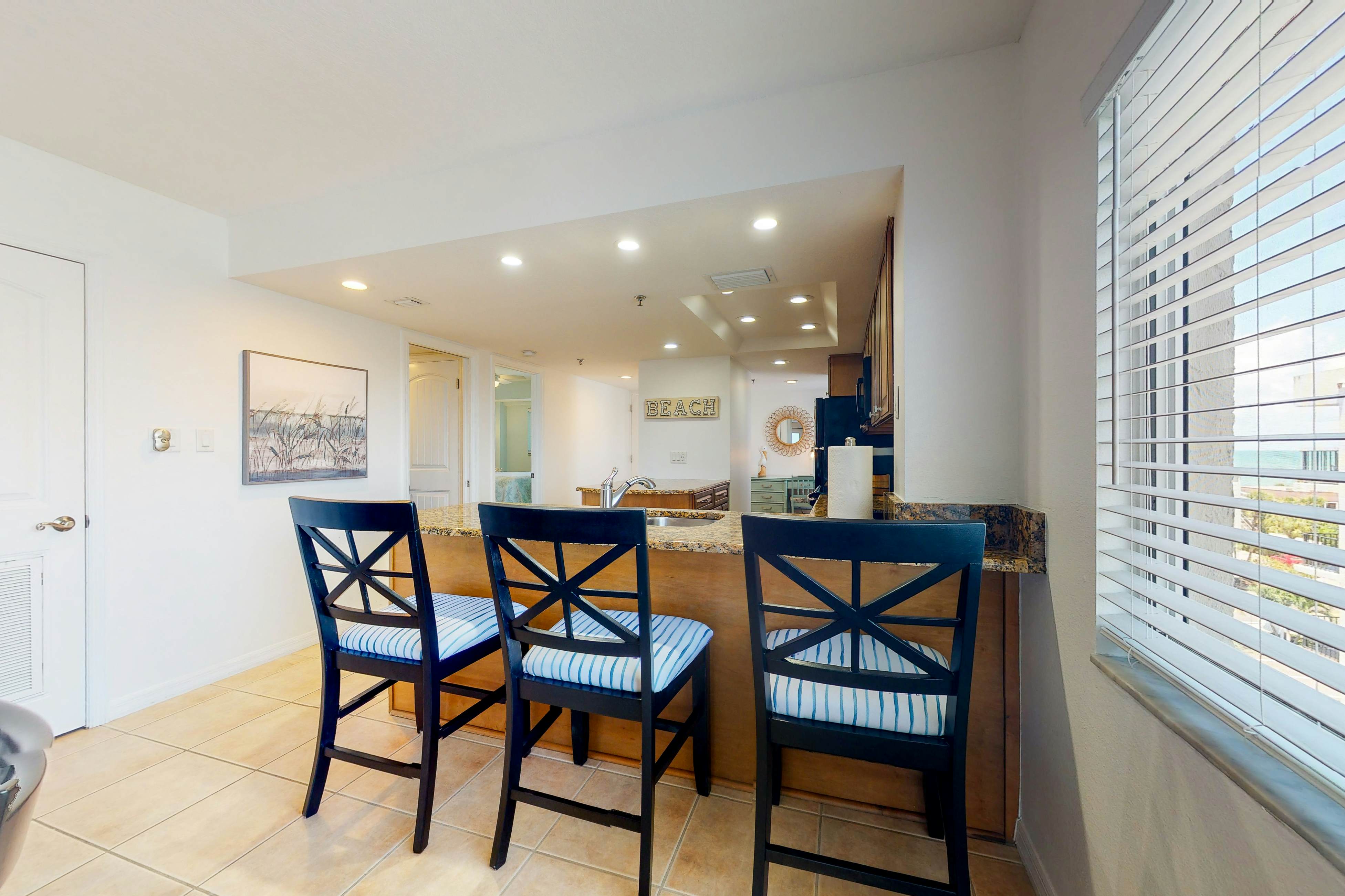 Beach condo with amazing views, heated pool, hot tub, central AC & W/D