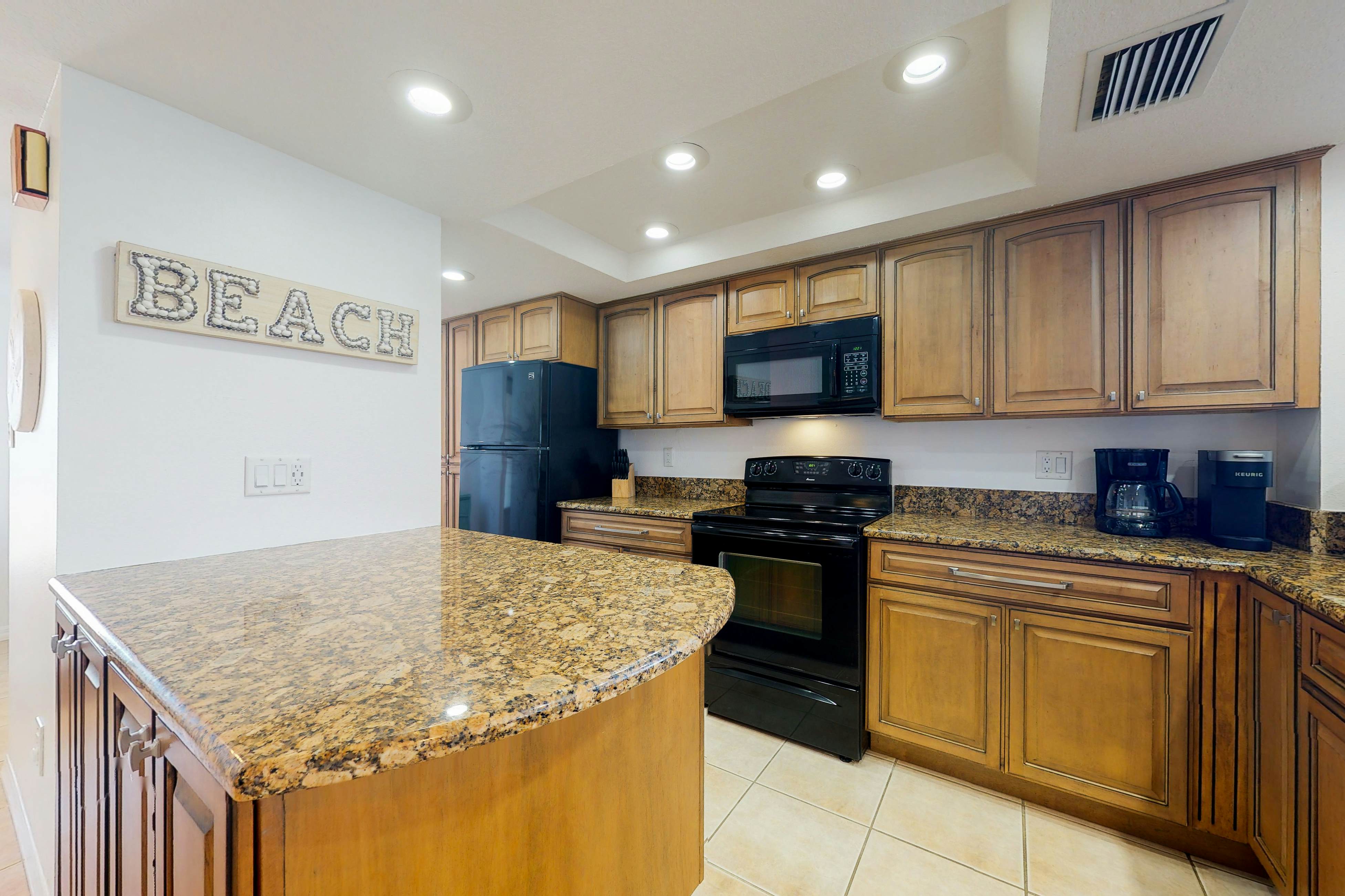 Beach condo with amazing views, heated pool, hot tub, central AC & W/D