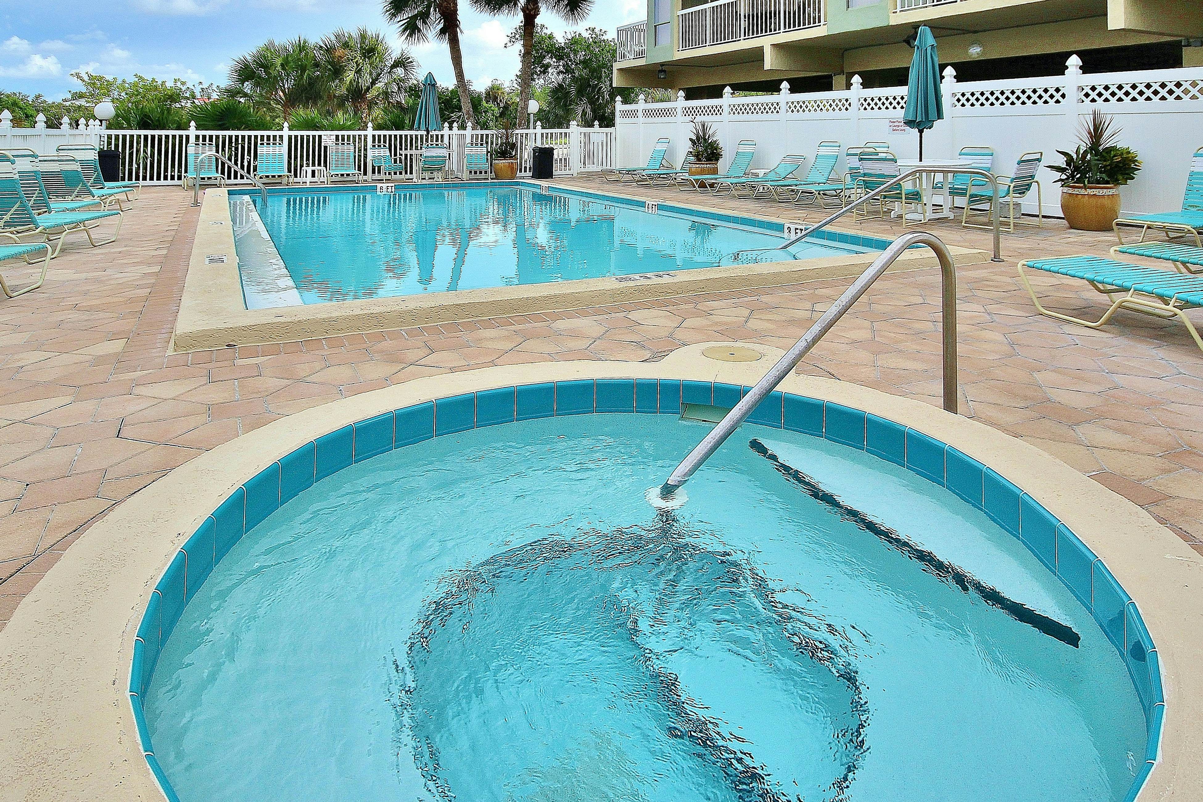 Beach condo with amazing views, heated pool, hot tub, central AC & W/D