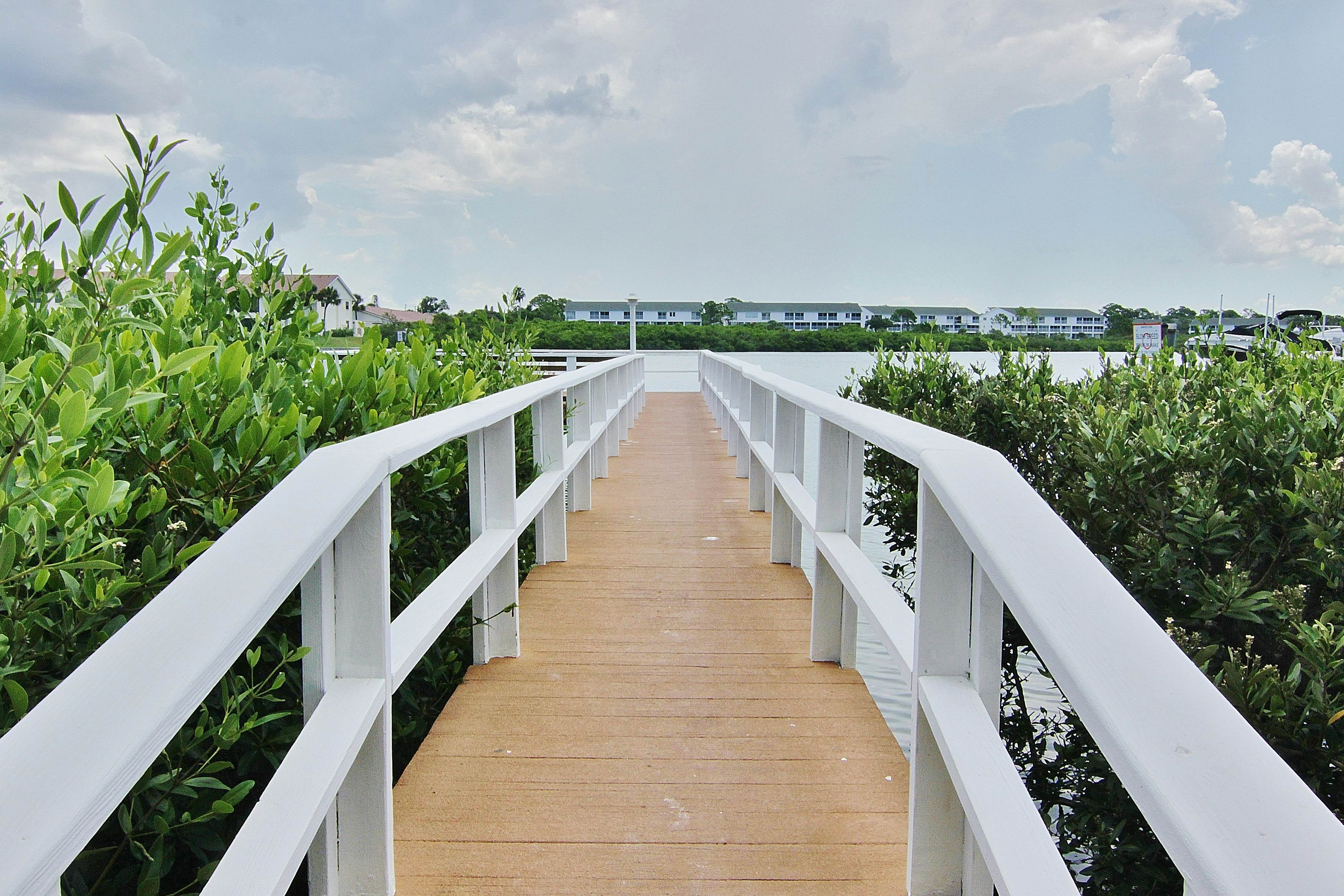 Gulf-side condo with heated pool, hot tub, central AC & W/D - snowbird-friendly