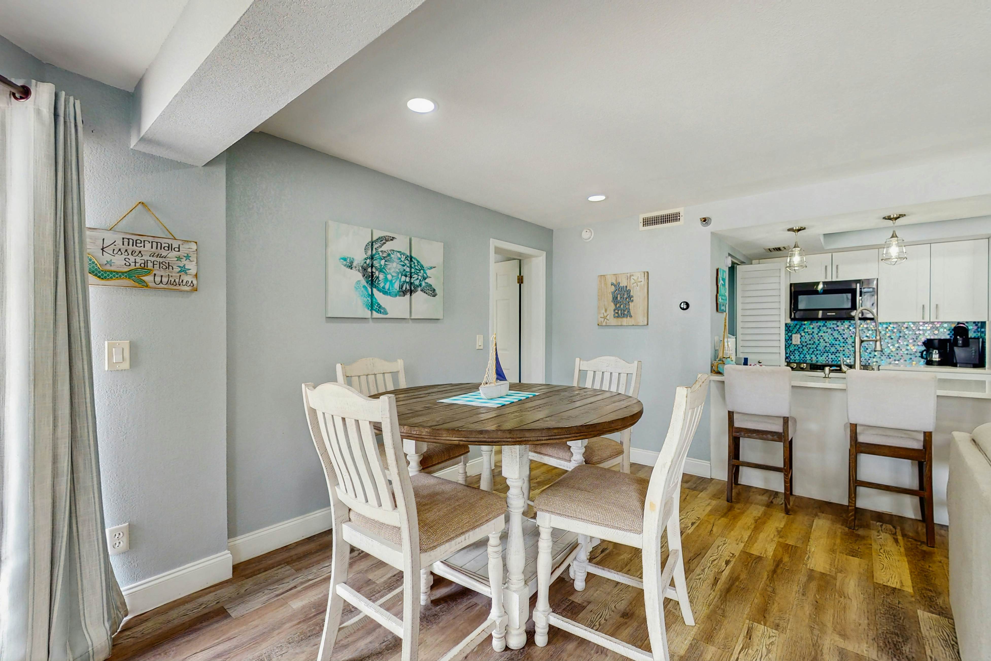 Gulf-side condo with heated pool, hot tub, central AC & W/D - snowbird-friendly