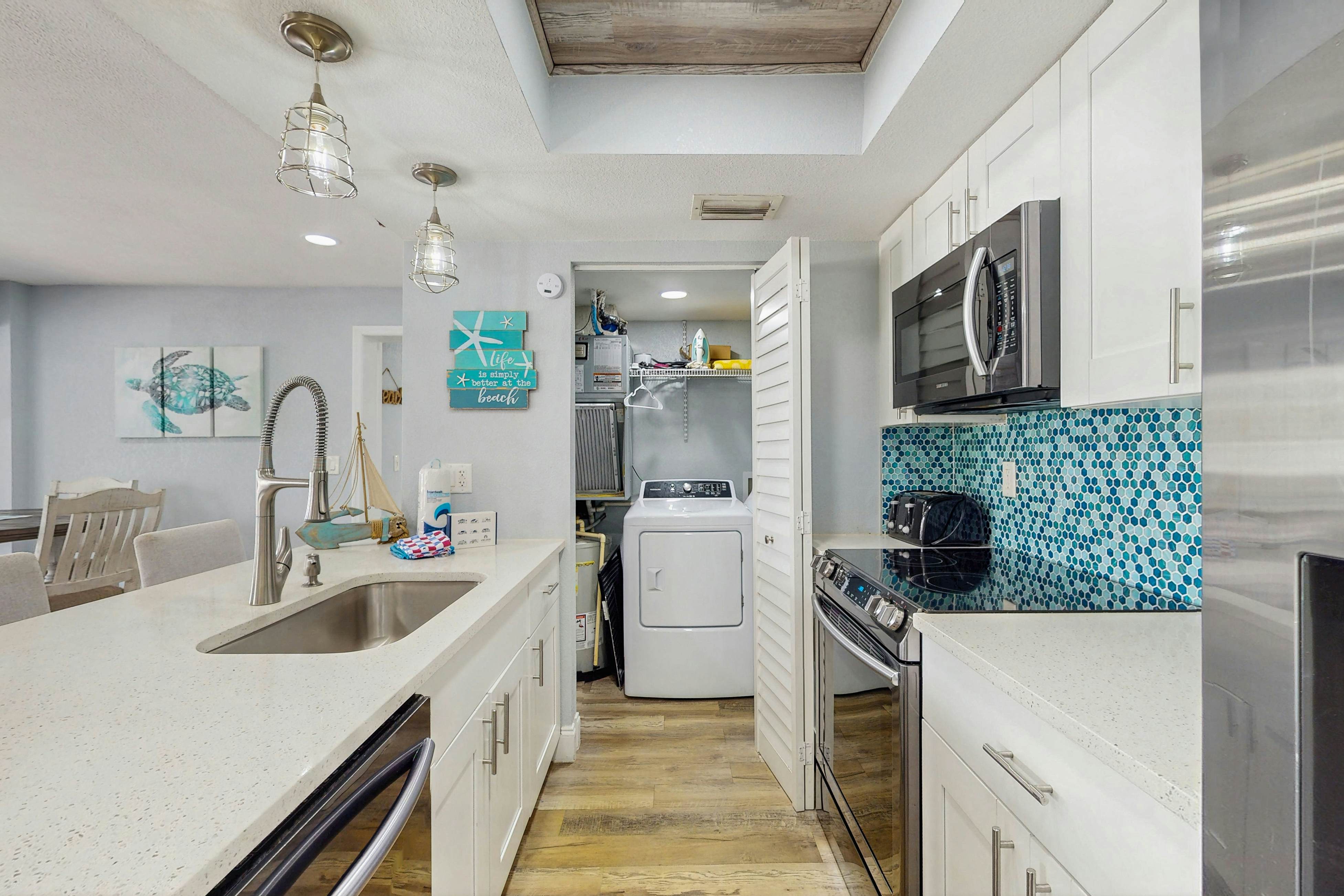 Gulf-side condo with heated pool, hot tub, central AC & W/D - snowbird-friendly