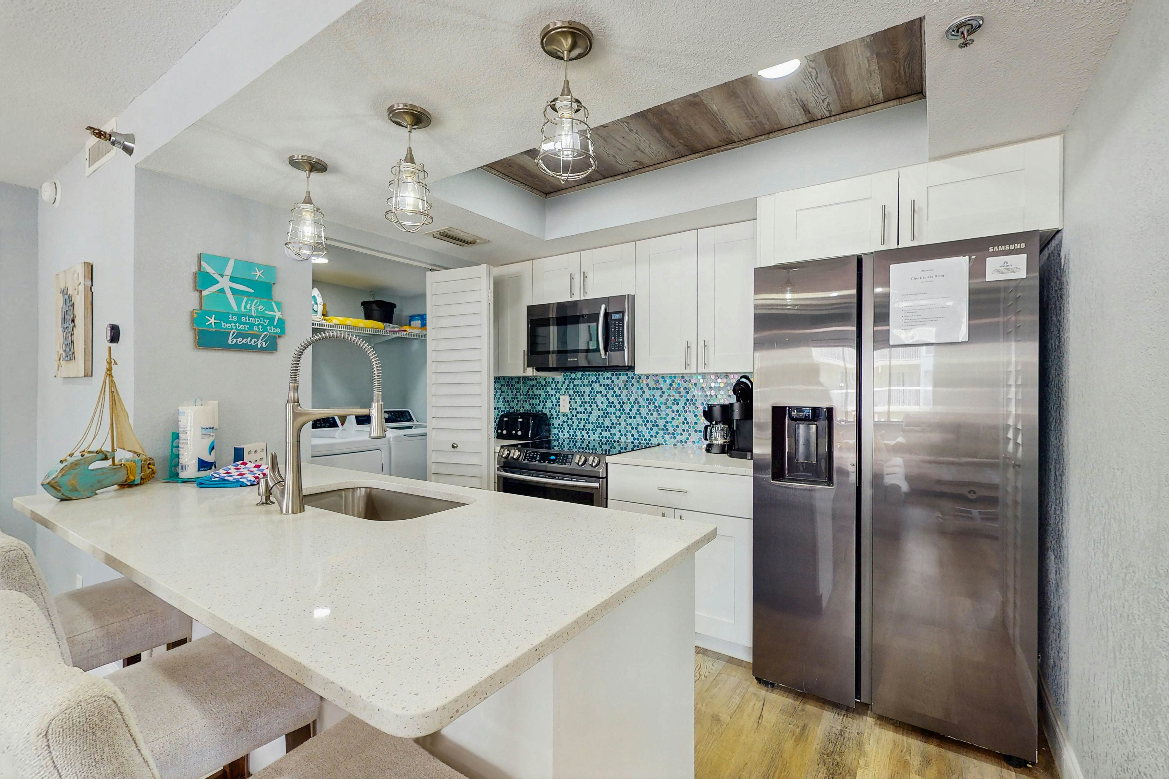 Gulf-side condo with heated pool, hot tub, central AC & W/D - snowbird-friendly