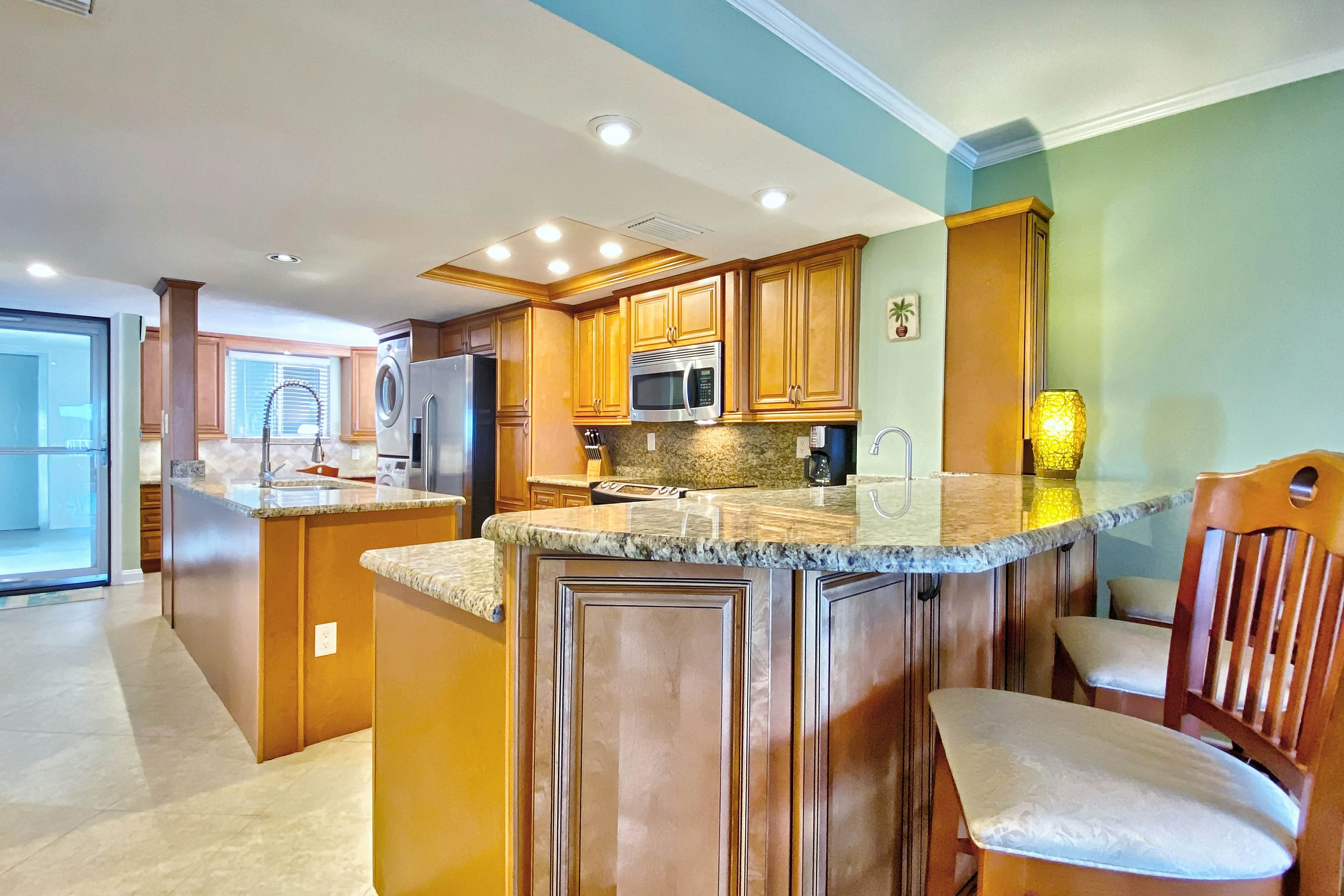 Water-view getaway with heated pool, hot tub, central AC & W/D - snowbird-friendly