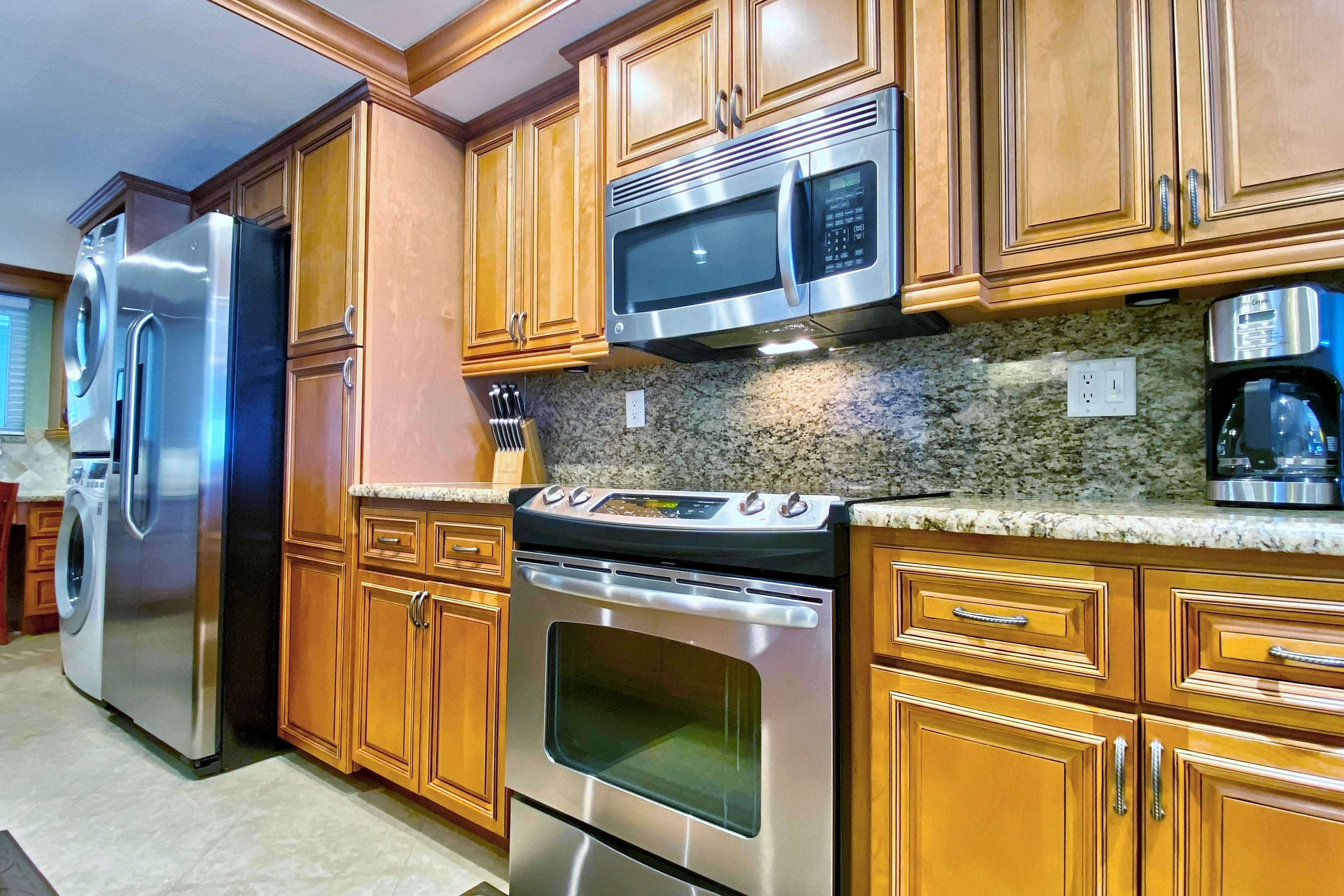 Water-view getaway with heated pool, hot tub, central AC & W/D - snowbird-friendly