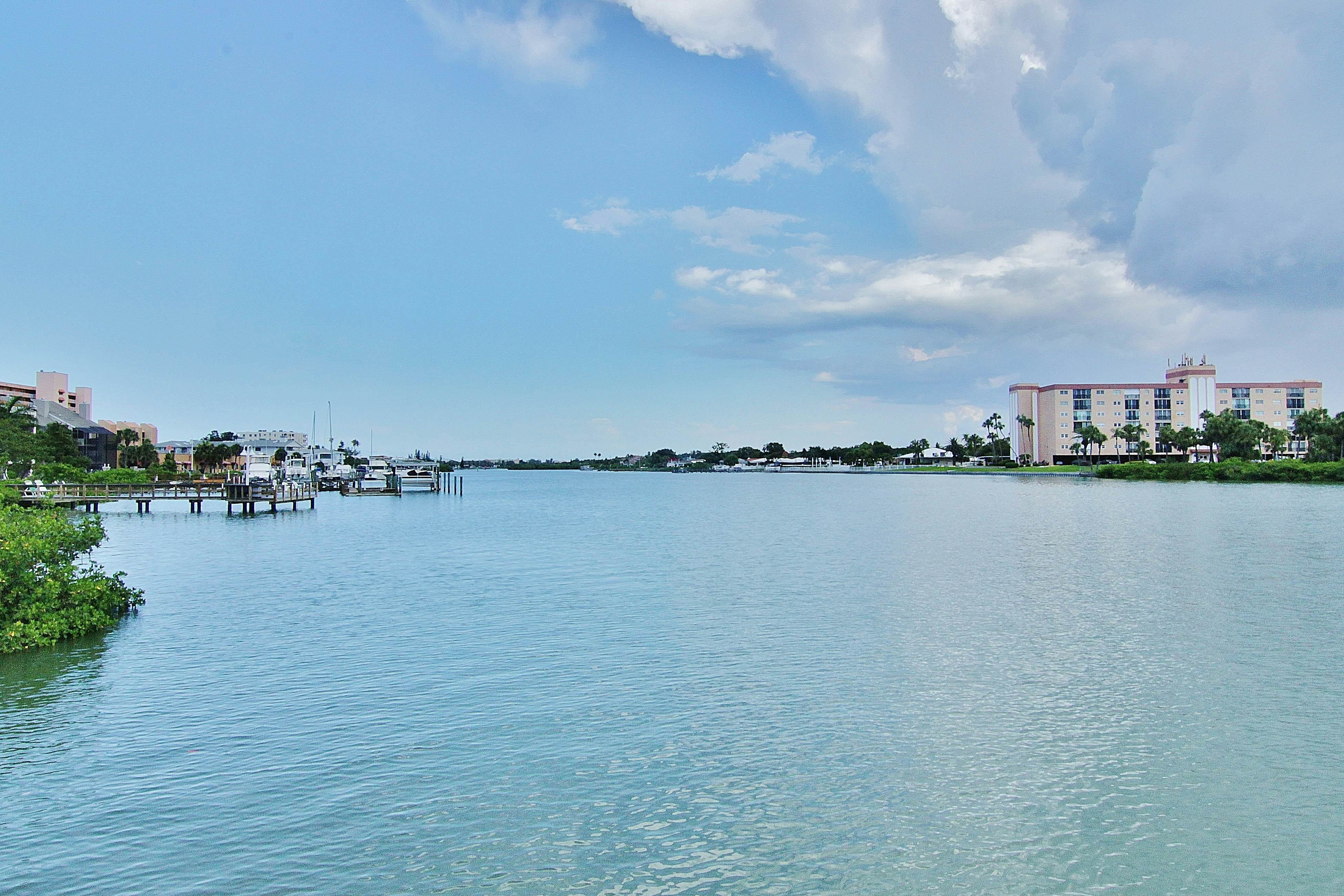 Water-view getaway with heated pool, hot tub, central AC & W/D - snowbird-friendly