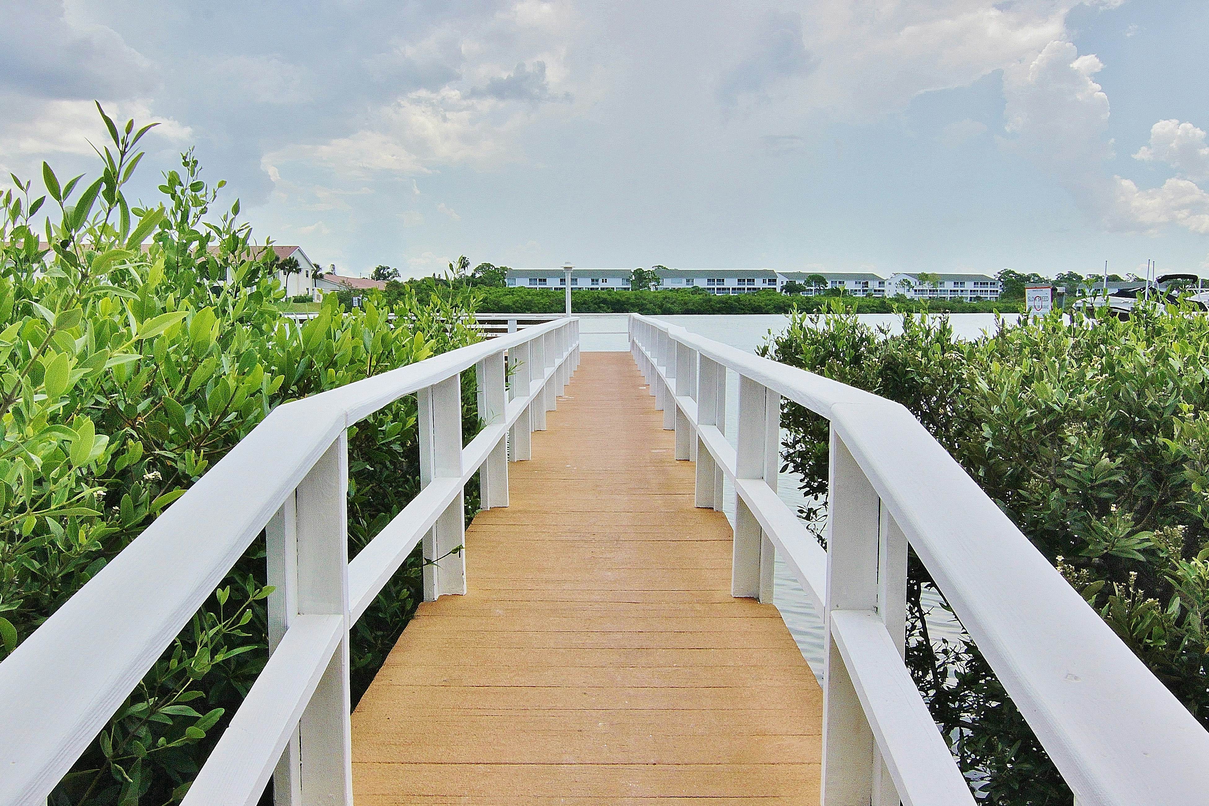 Water-view getaway with heated pool, hot tub, central AC & W/D - snowbird-friendly