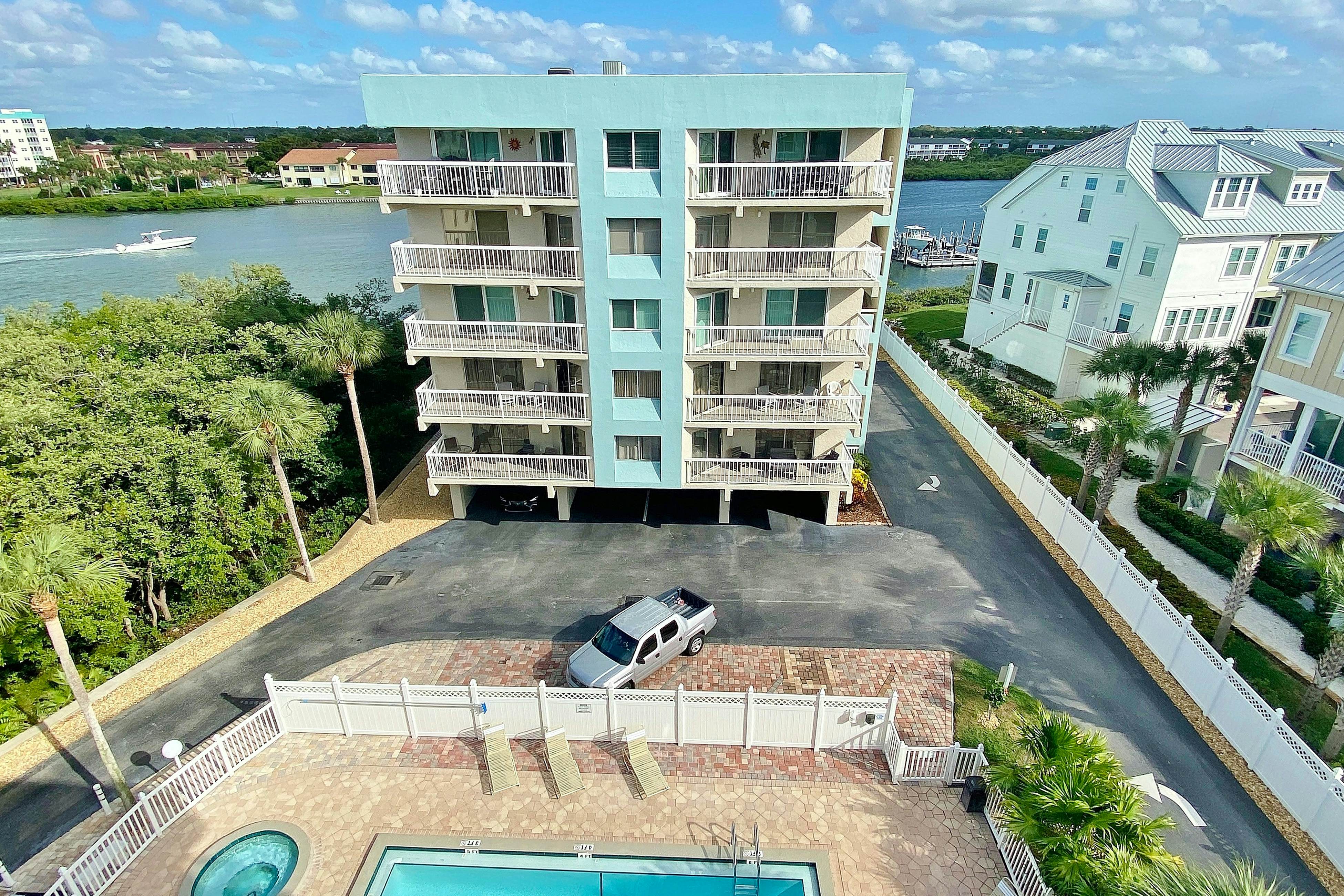 Water-view getaway with heated pool, hot tub, central AC & W/D - snowbird-friendly