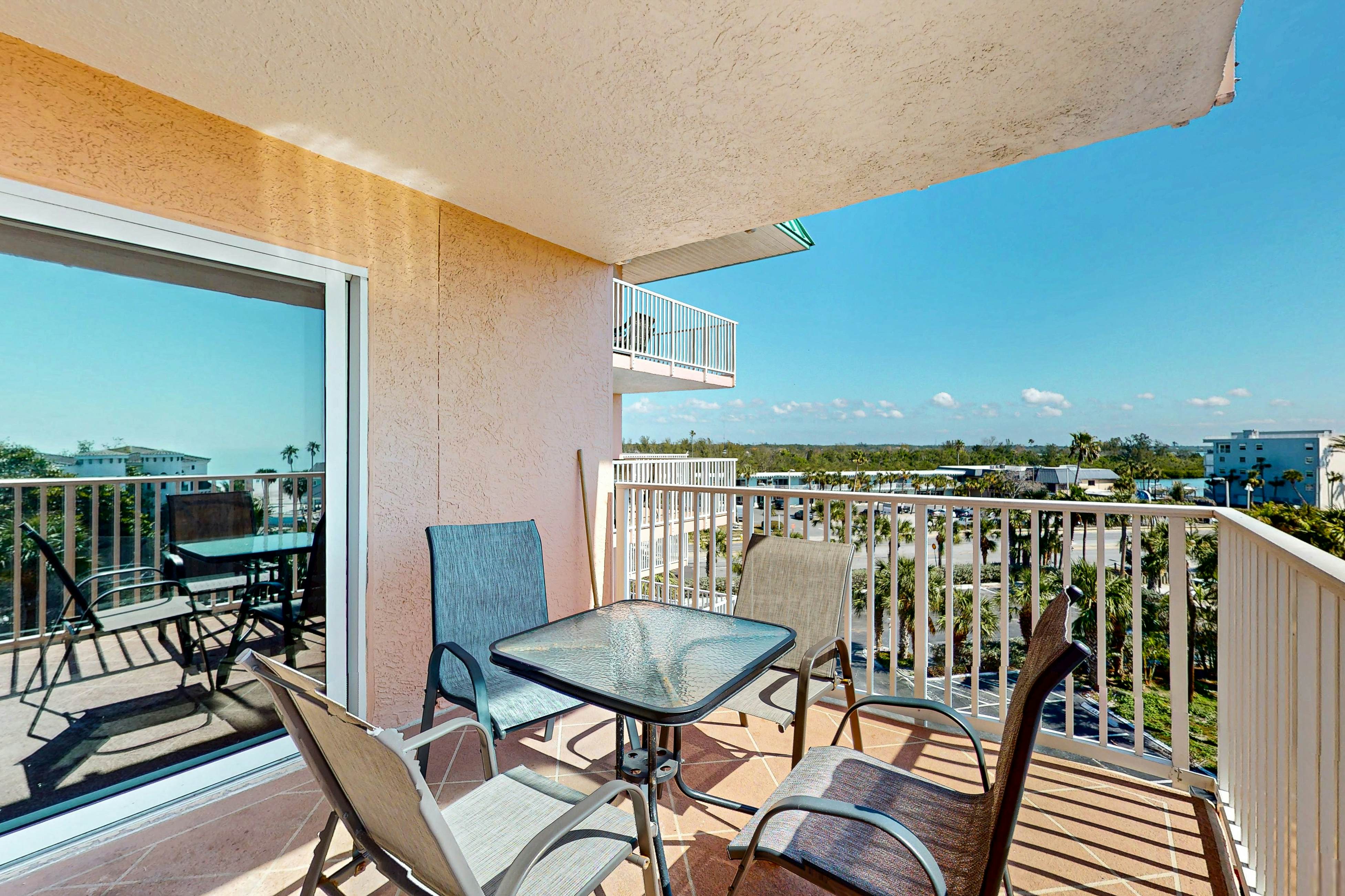 Seashore getaway with partial Gulf view & beachfront heated pool & spa