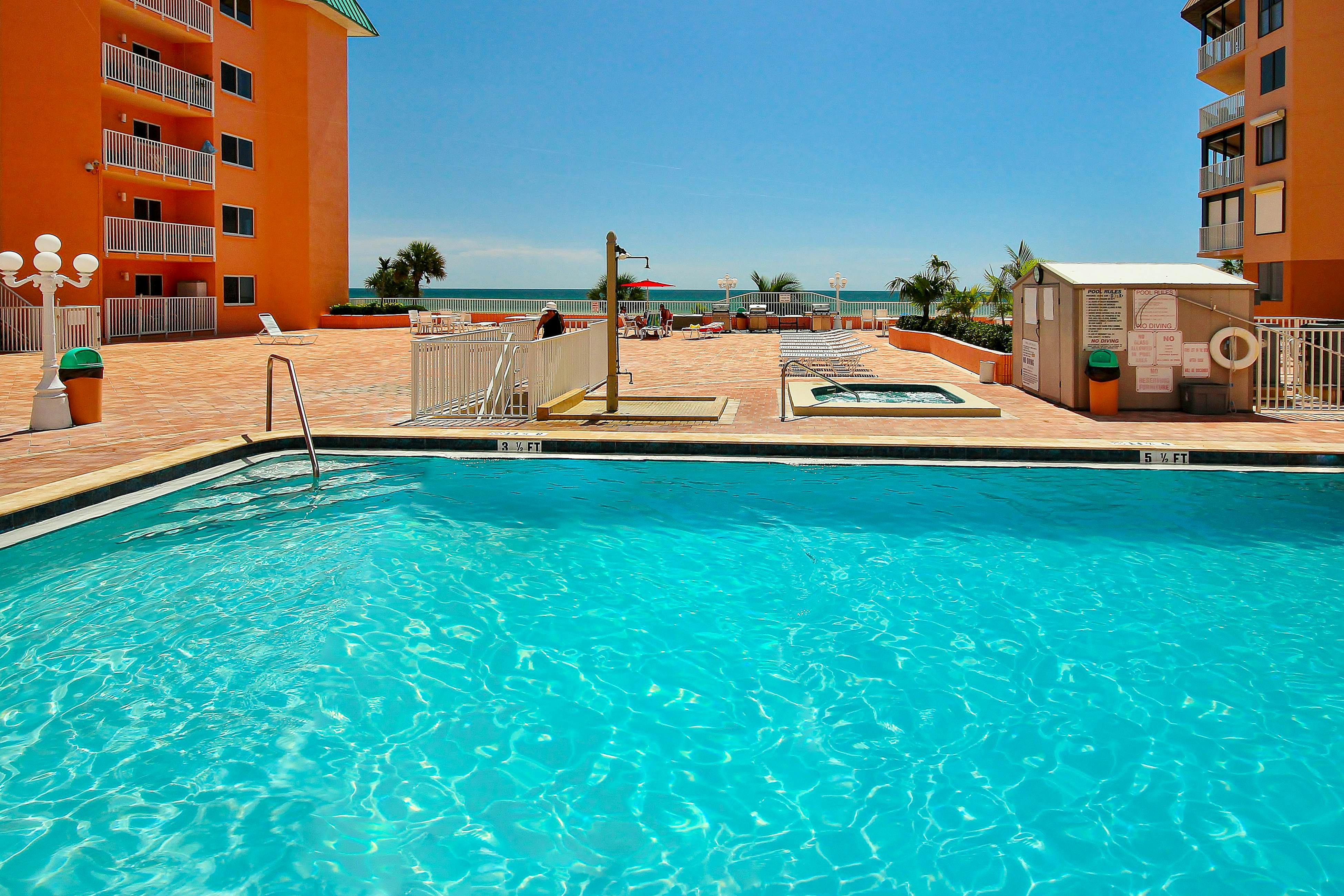 Seashore getaway with partial Gulf view & beachfront heated pool & spa