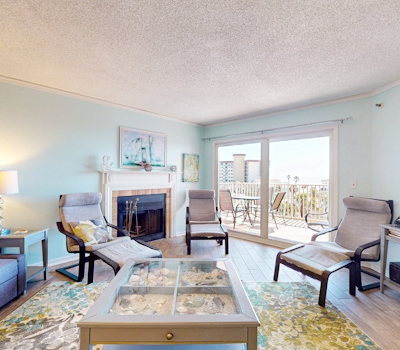 Seashore getaway with partial Gulf view and beachfront heated pool and spa