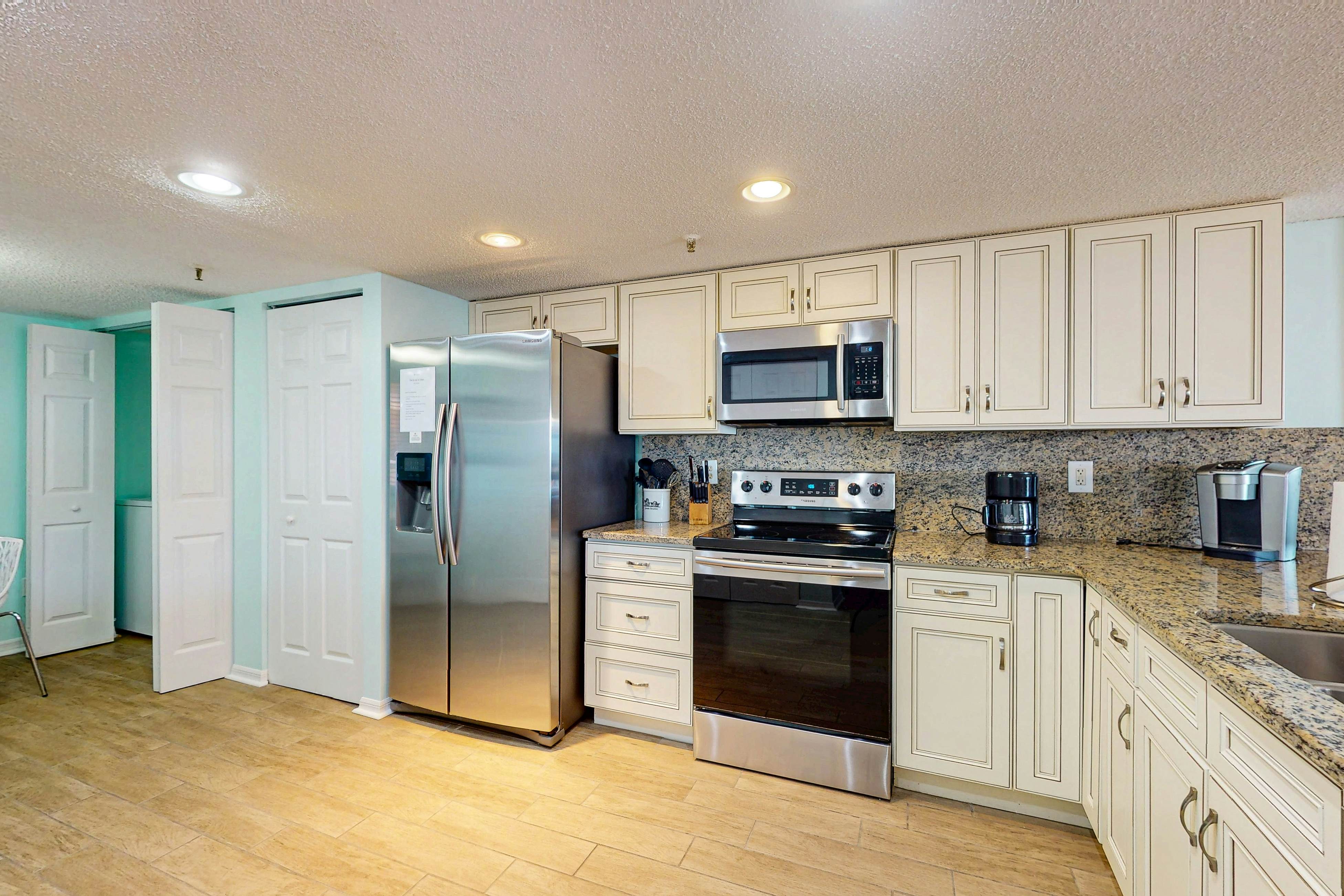 Seashore getaway with partial Gulf view & beachfront heated pool & spa