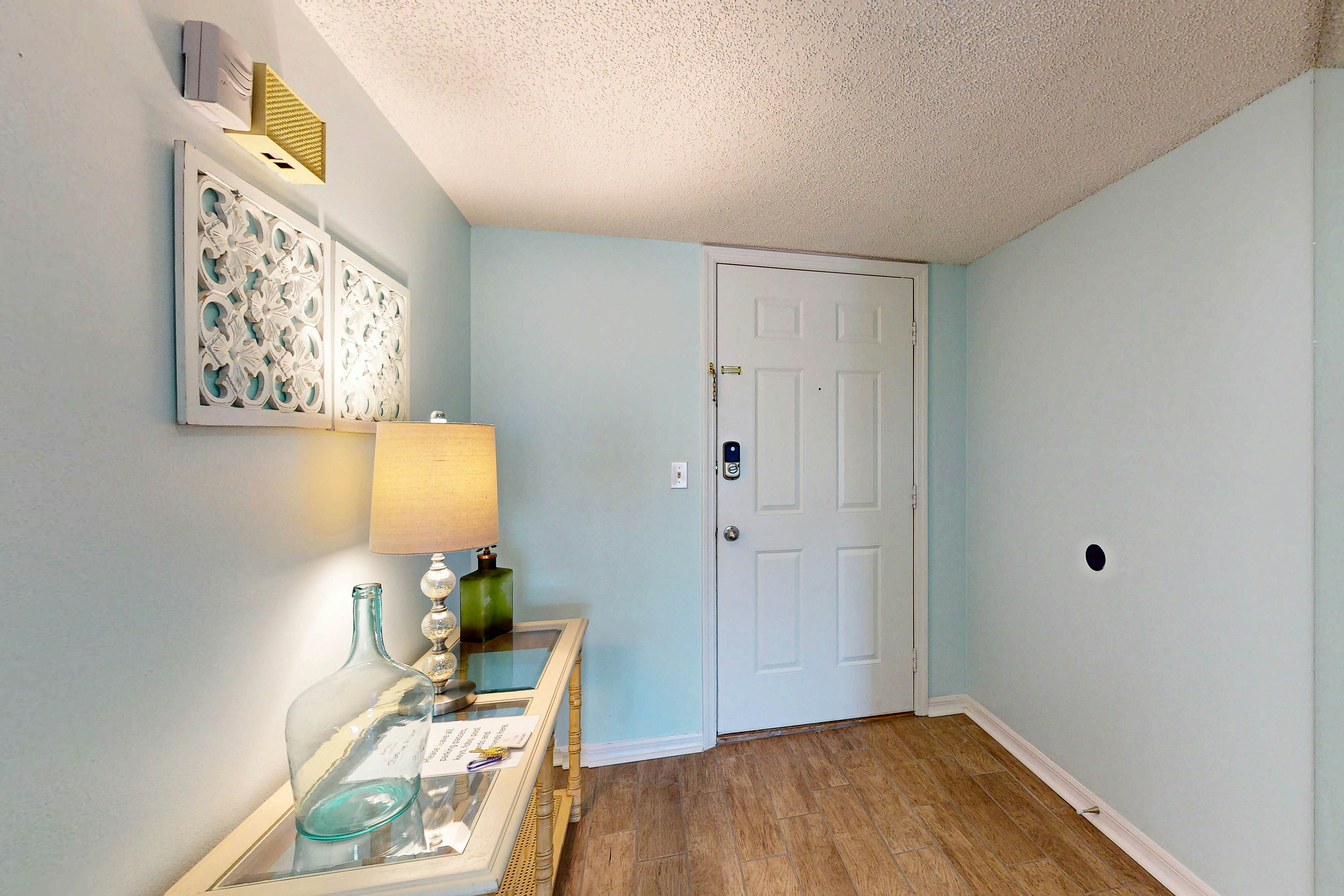 Seashore getaway with partial Gulf view & beachfront heated pool & spa