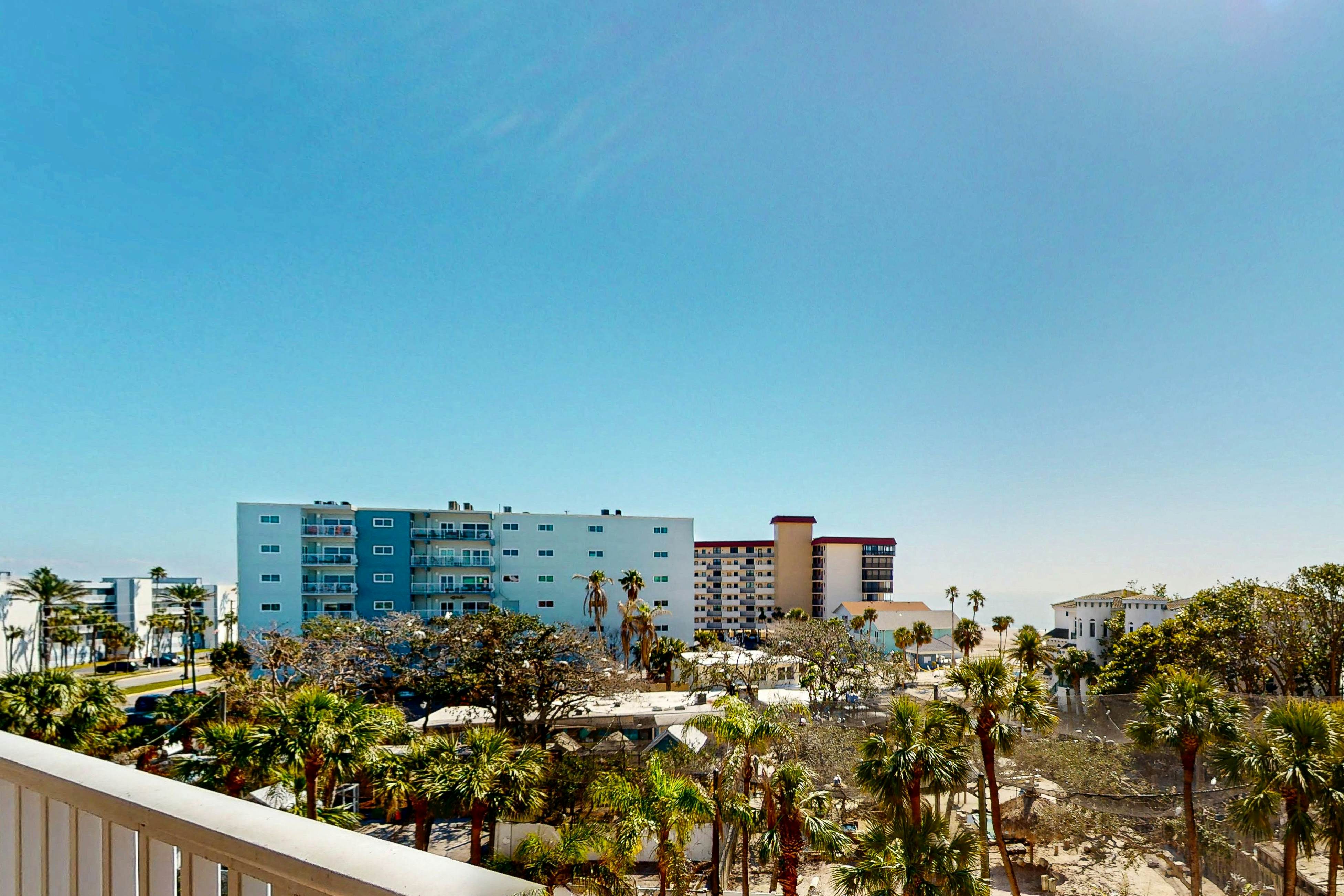 Seashore getaway with partial Gulf view & beachfront heated pool & spa