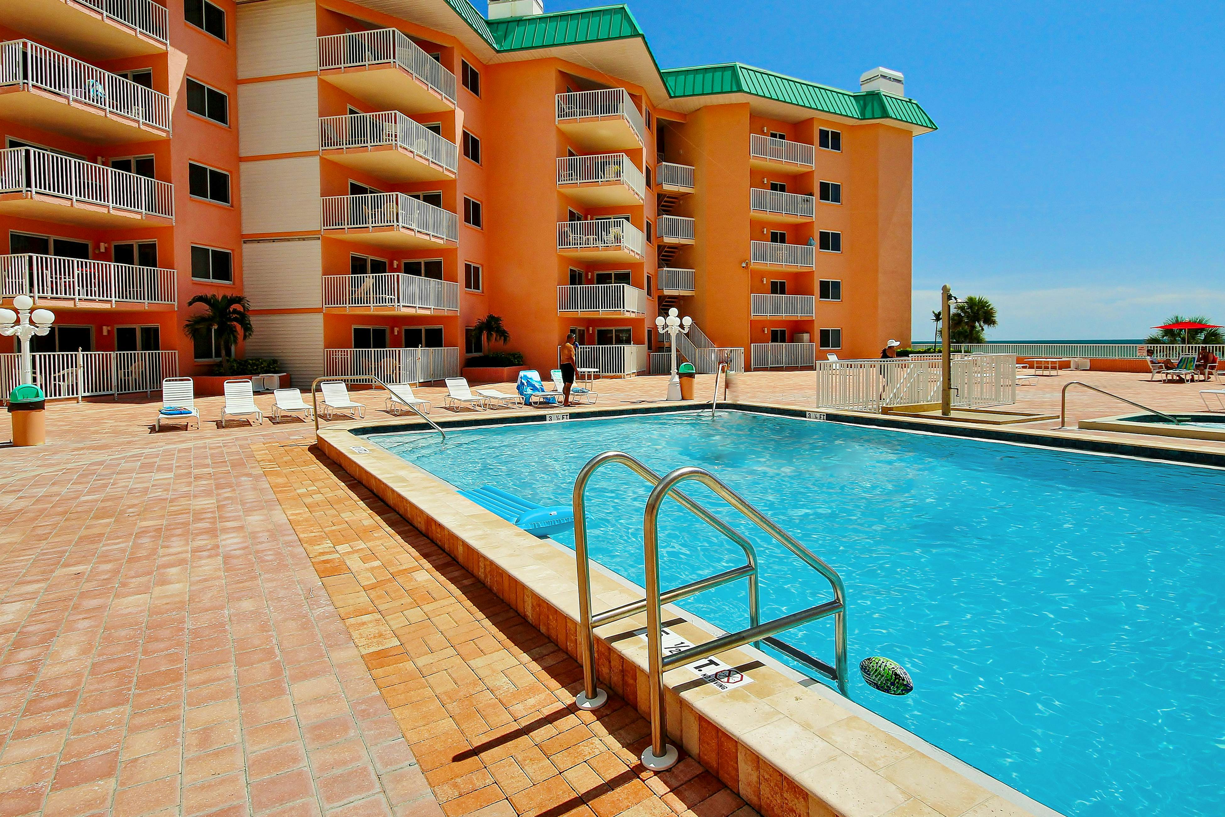 Seashore getaway with partial Gulf view & beachfront heated pool & spa