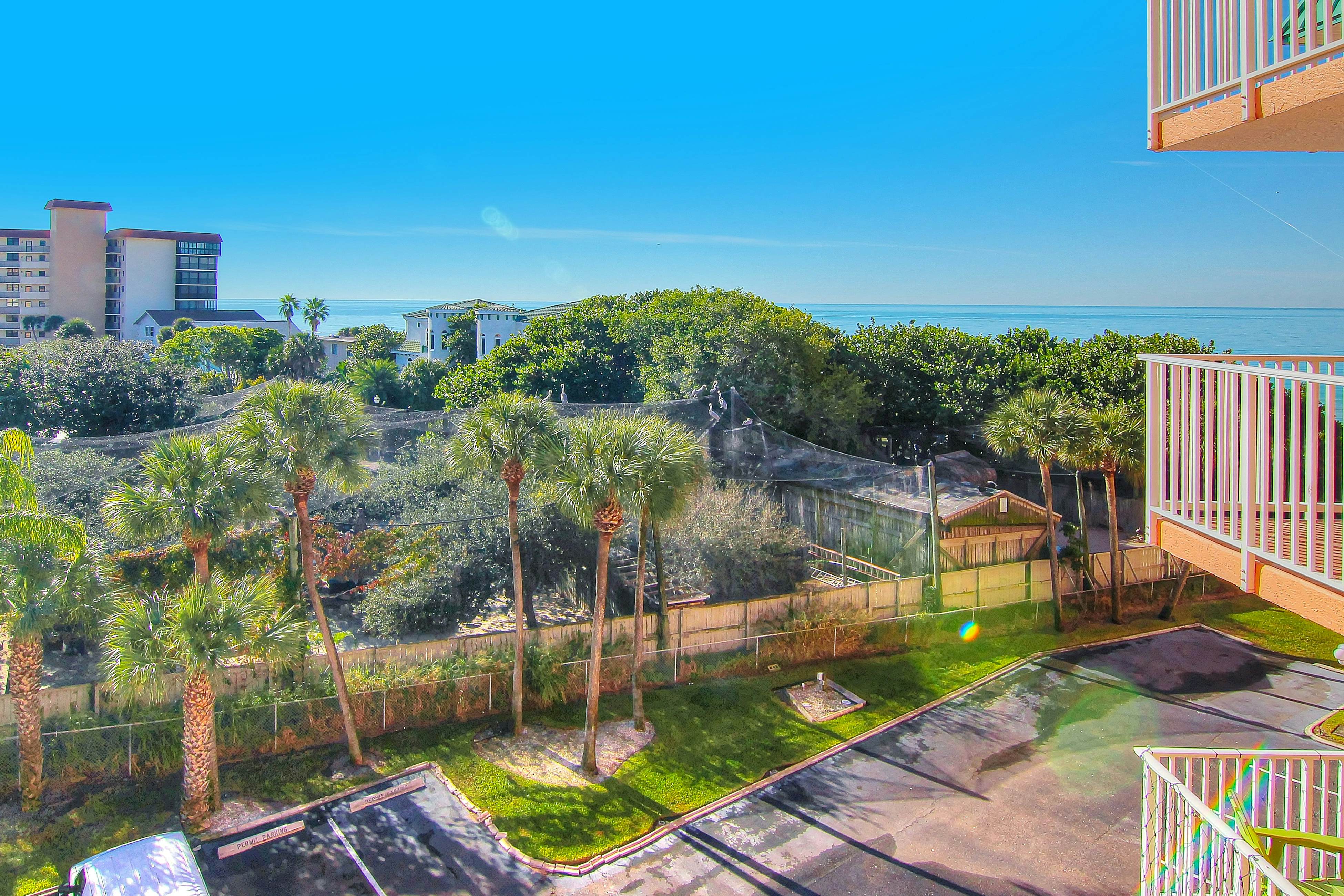 Seashore getaway with partial Gulf view & beachfront heated pool & spa