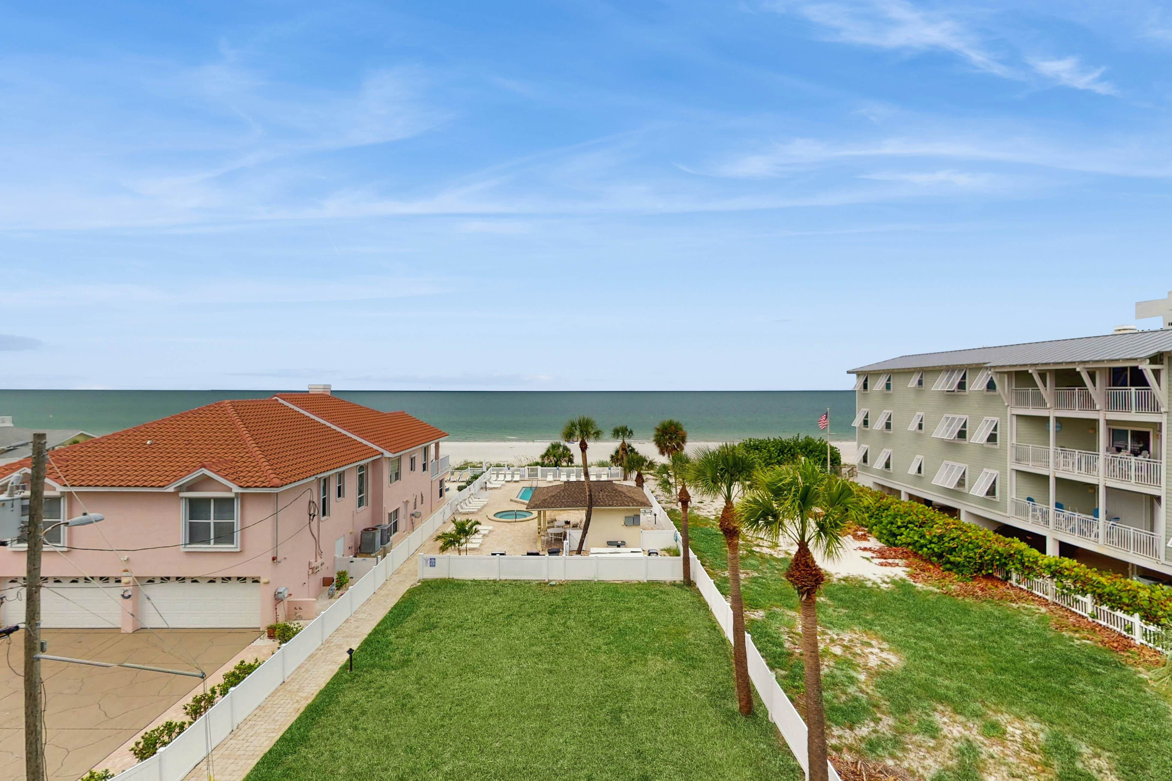 Sand Castle condo with Gulf-view balcony, heated pool, hot tub & beach access