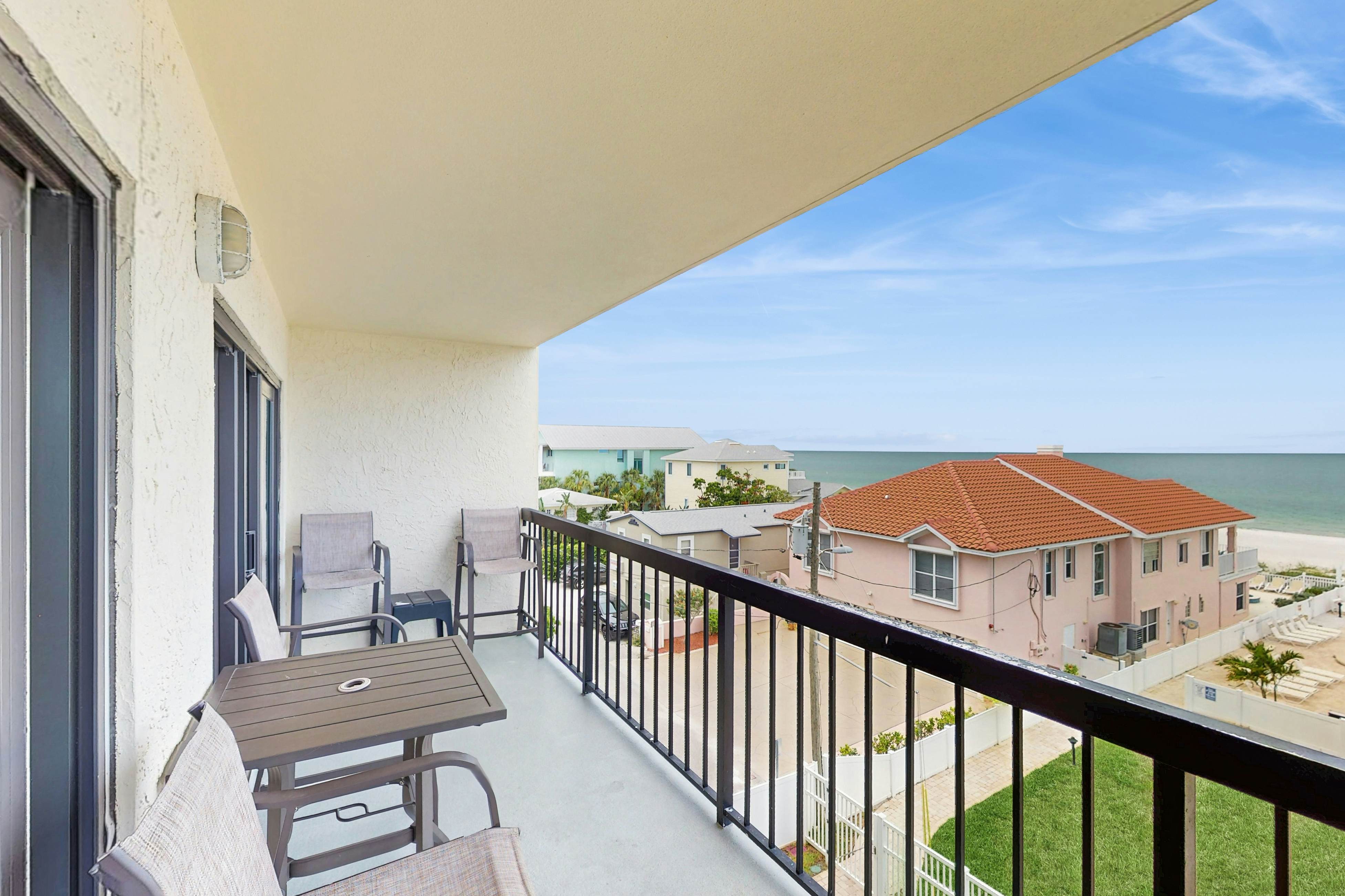 Sand Castle condo with Gulf-view balcony, heated pool, hot tub & beach access