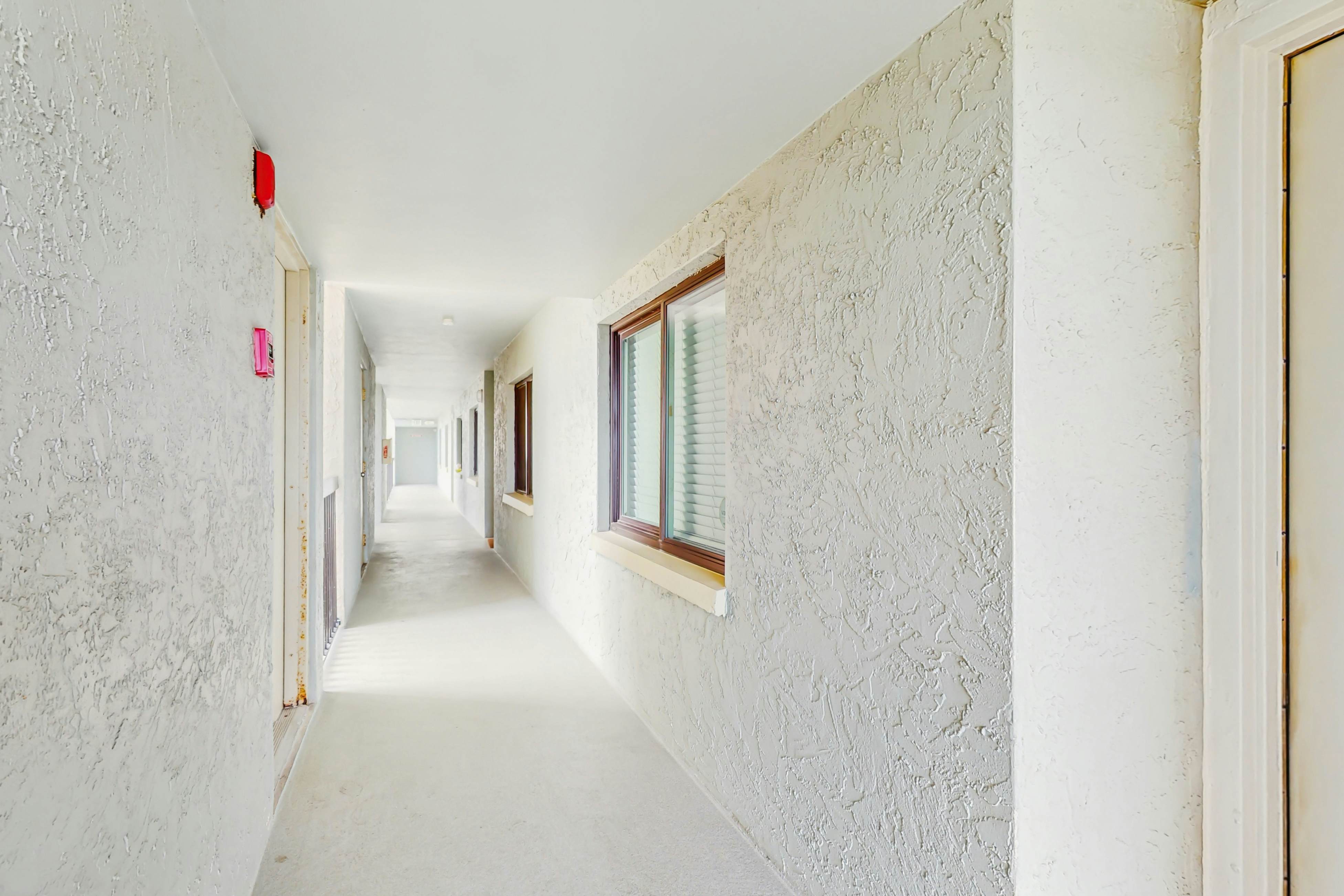 Sand Castle condo with Gulf-view balcony, heated pool, hot tub & beach access