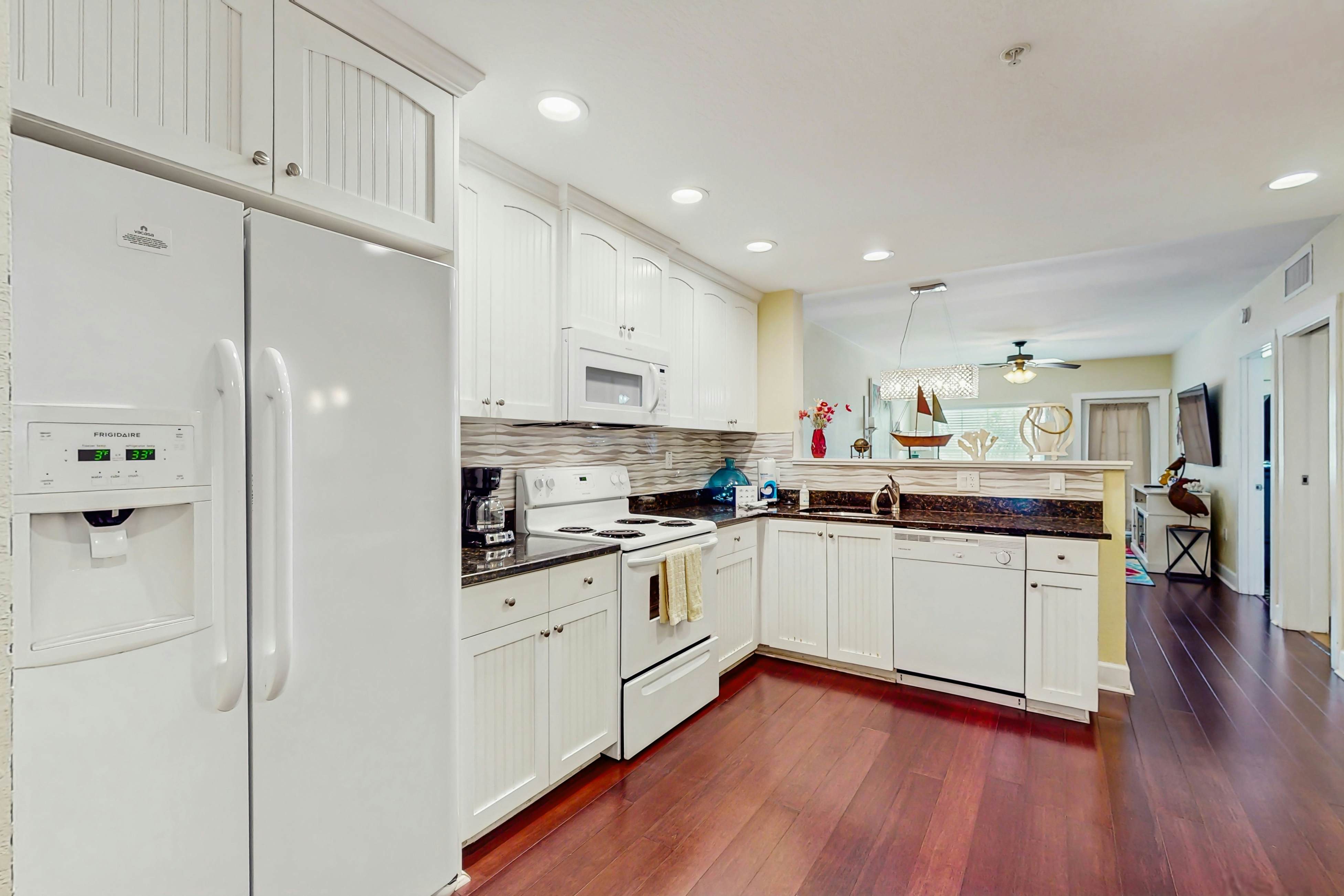 Stylish, snowbird-friendly condo near the beach with AC & W/D - dog-friendly