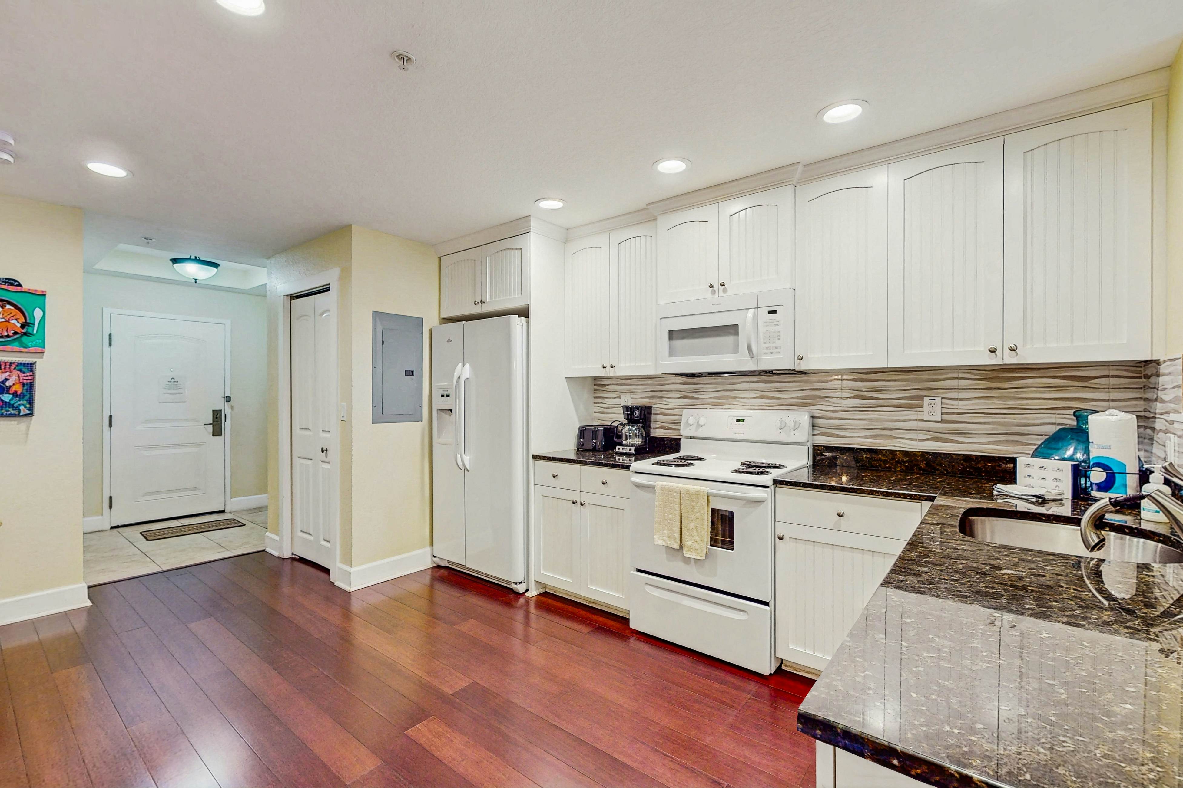 Stylish, snowbird-friendly condo near the beach with AC & W/D - dog-friendly